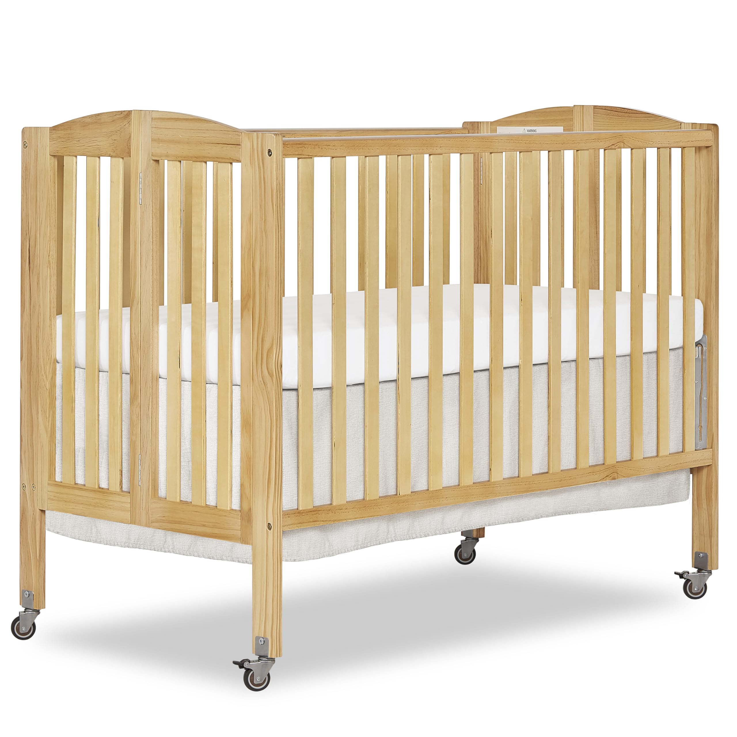 Photo 1 of Dream On Me Full-Size 2-in-1 Folding Baby Crib in Natural, GreenGuard Gold & BSA, Portable, Patented Quick Folding System, Strong Wheels, 2 Adjustable Mattress Heights