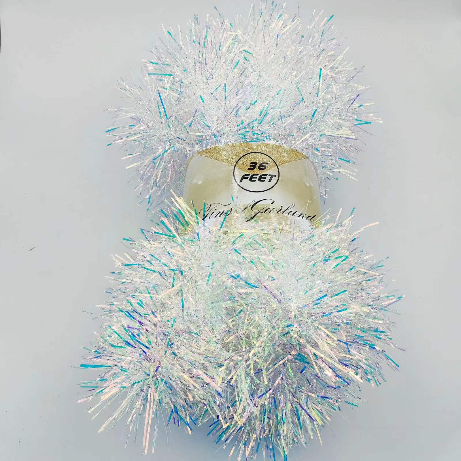 Photo 1 of YOOGCORETT 36 FT Christmas Tinsel Garland Glitter Tinsel Streamers for Classic Christmas Tree Decorations Wedding Holiday Party Indoor and Outdoor Decorations Supplies (Iridescent)
