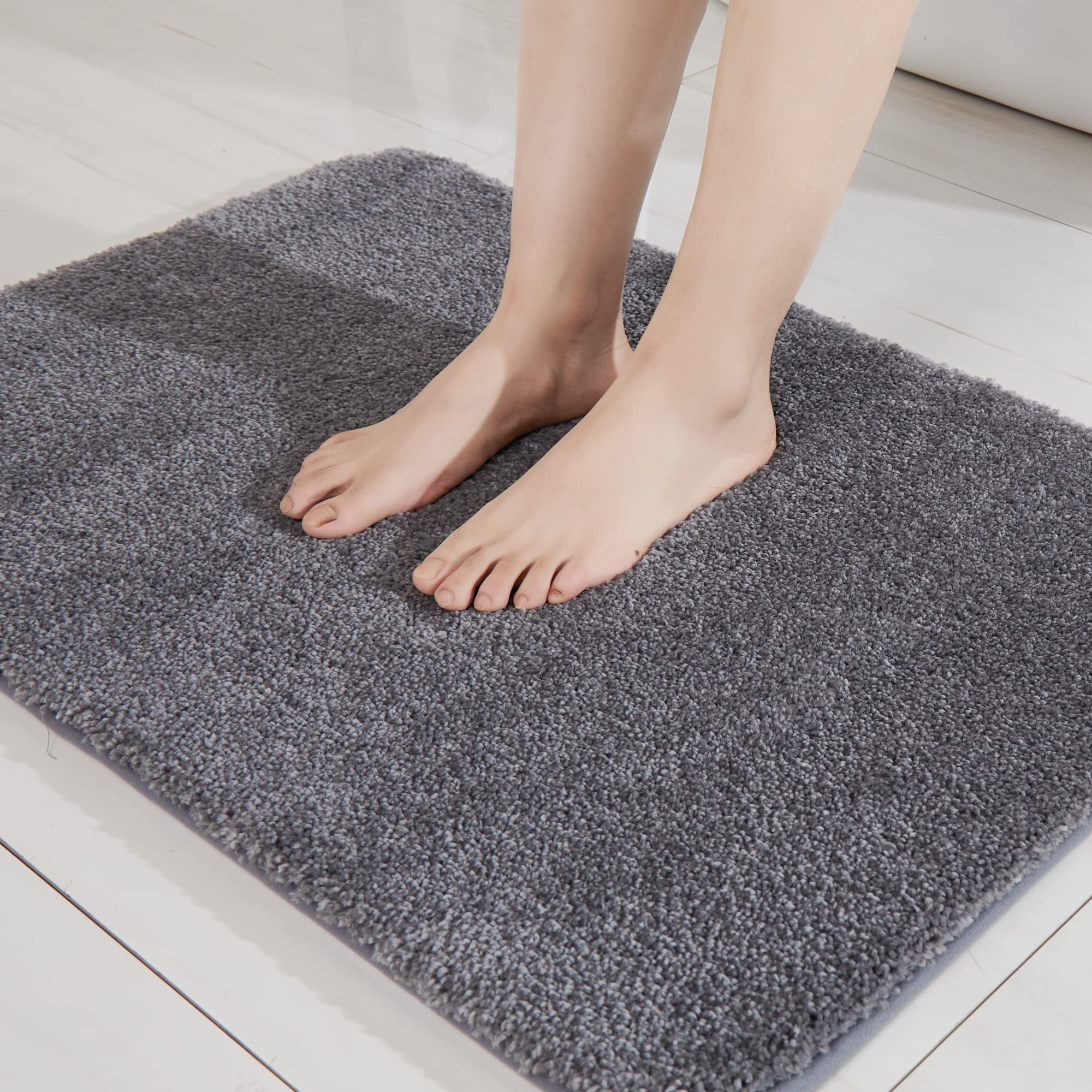 Photo 1 of COSY HOMEER Extra Thick Bath Rugs for Bathroom - Anti-Slip Bath Mats Soft Plush Yarn Shaggy 100% Strong Mirco Polyeste Mat Living Room Bedroom Mat Floor Water Absorbent(Dark Grey,16x24 - Inches)