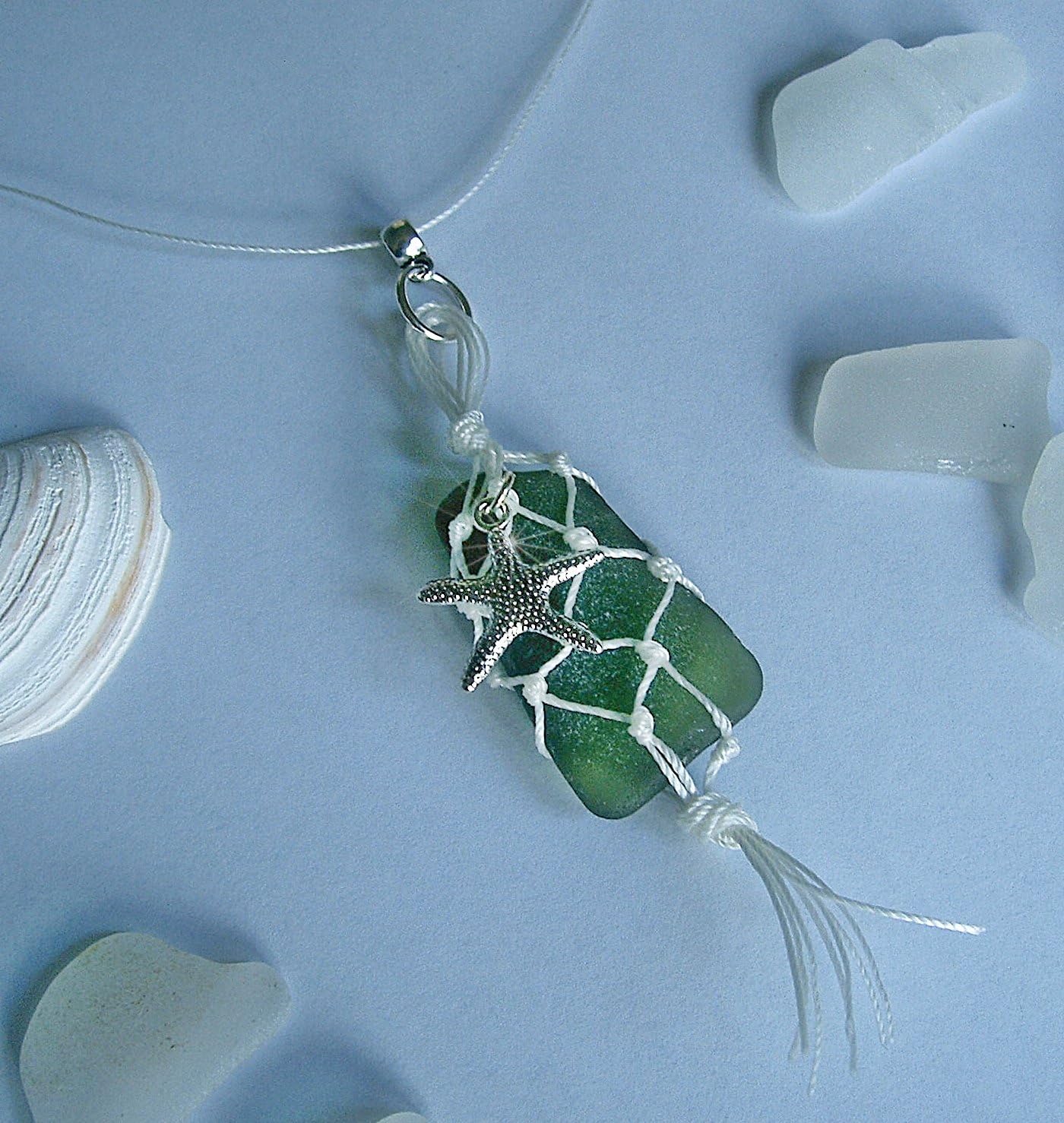 Green  sea  glass  in  a  fishing  net necklace