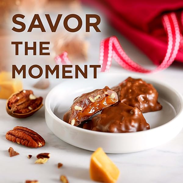 RUSSELL STOVER PECAN DELIGHT GUSSET BAG 16.10 OUNCE RUSSEL STOVER MILK CHOCOLATE COVERED CANDY PACK, CRUNCHY PECANS AND BUTTERY CARAMEL COVERED IN SWEET MILK CHOCOLATE CANDY, INDIVIDUALLY WRAPPED