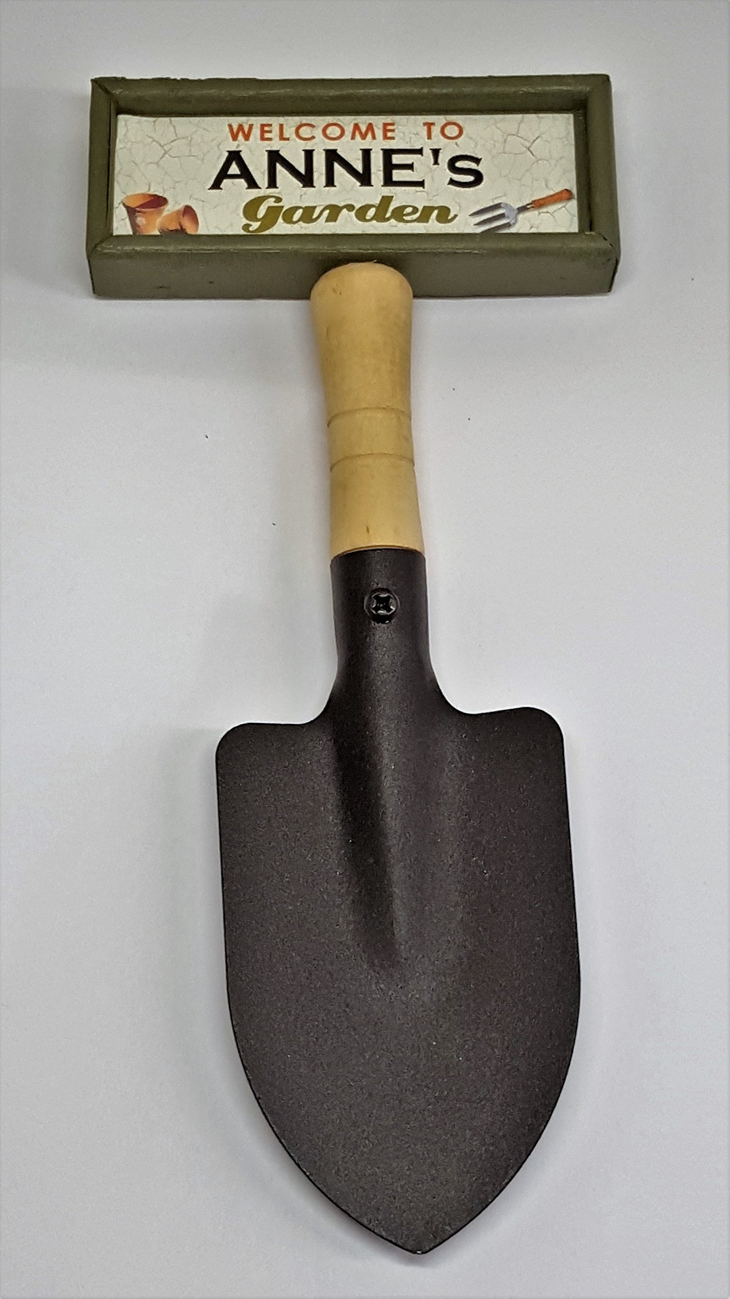 "Welcome to Anne's garden" hanging shovel sign