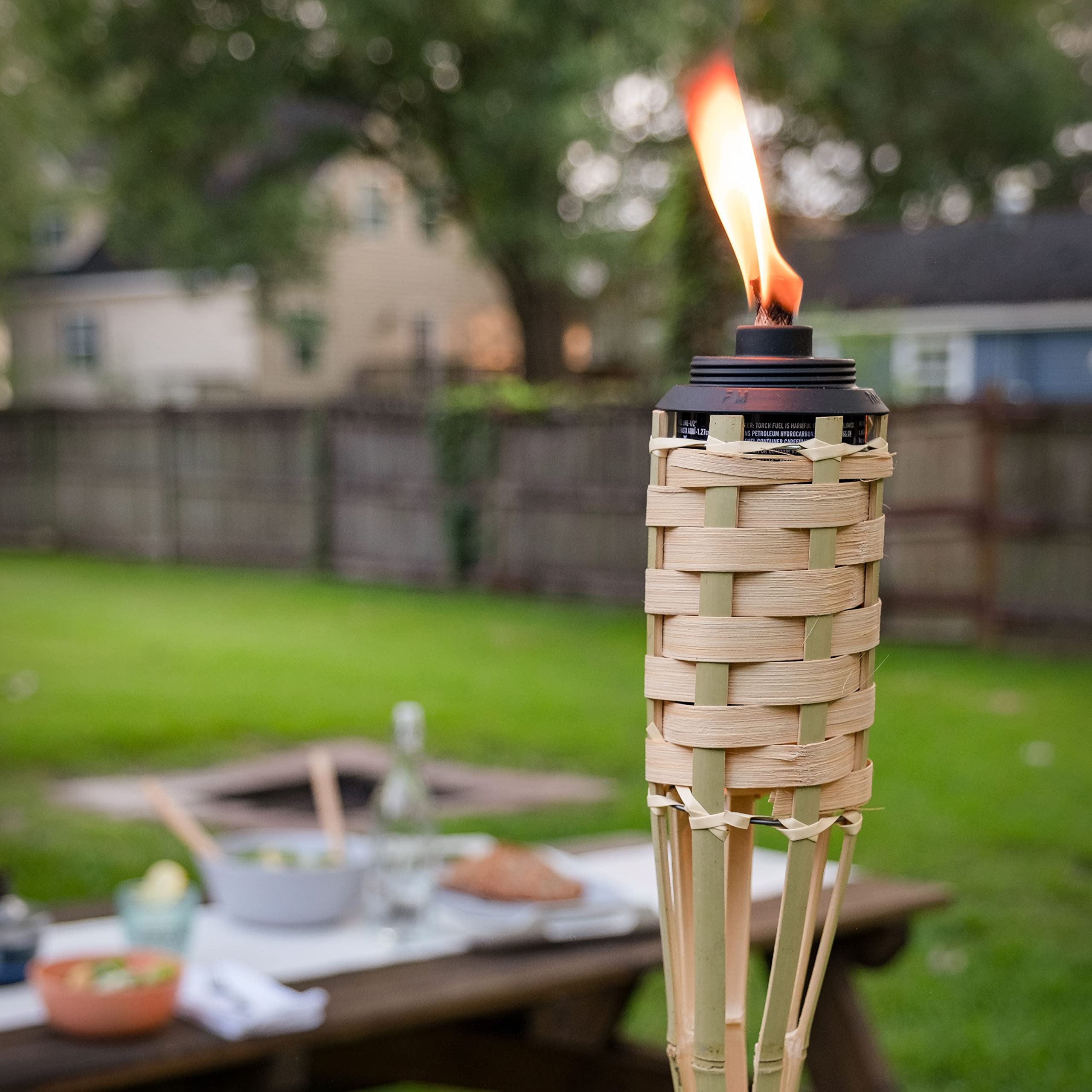 TIKI Bamboo Tiki Torches 4-Pack – Weather-Resistant Outdoor Décor with Easy-Pour Wide-Mouth Canister Refill for Patio, Garden, Backyard, and Parties, 57-Inch Citronella Torches