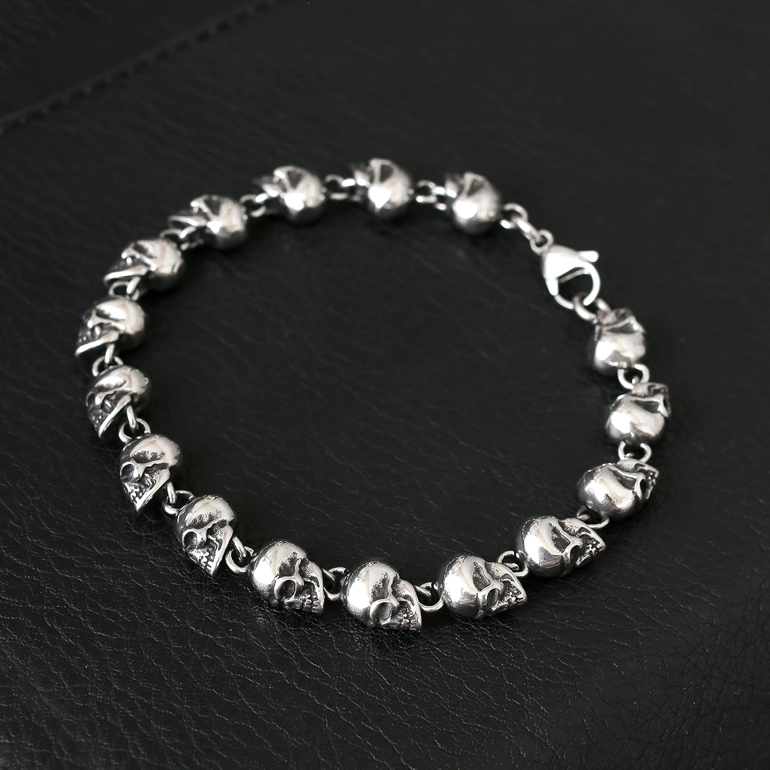 HAQUIL Stainless Steel Skull Charm Linked Bracelet for Men and Women, 8.27": Clothing