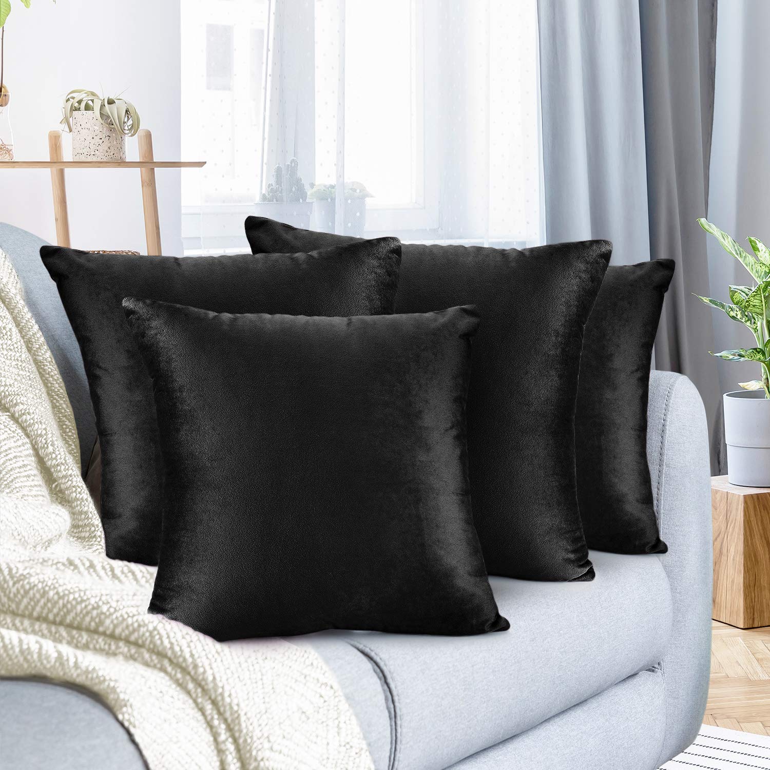 Nestl Throw Pillow Covers, Cozy Velvet Decorative Pillow Cases 24x24 Inches, Soft Solid Couch Pillow Covers for Sofa, Bed and Car, Set of 4 - Black Image