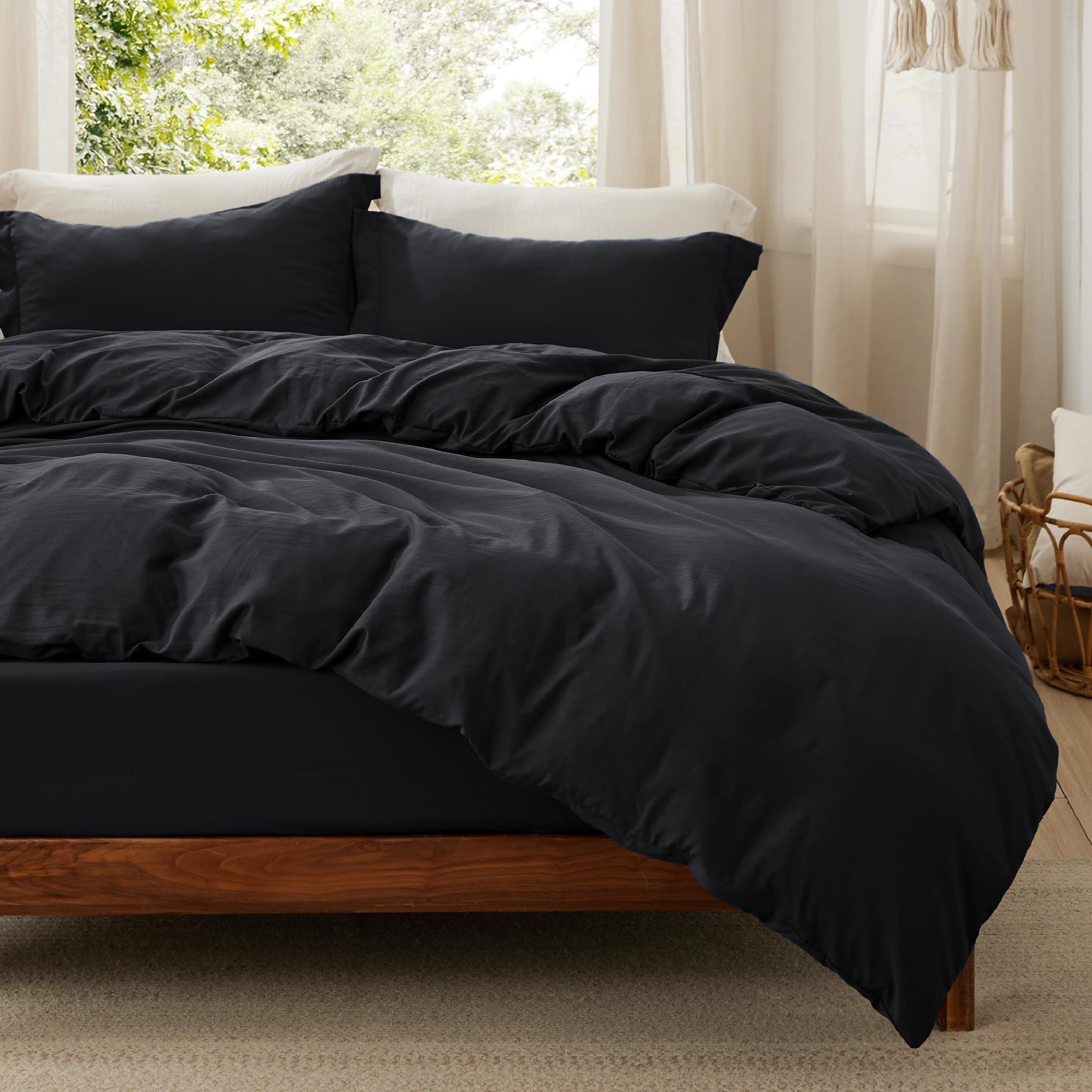 Photo 1 of Bedsure Duvet Cover Queen Size with Fitted Sheet - 4 Pieces Prewashed Extra Soft Bedding Set, Includes 1 Duvet Cover 90x90 Inches with Zipper Closure, 2 Pillow Shams, 1 Fitted Sheet, Black