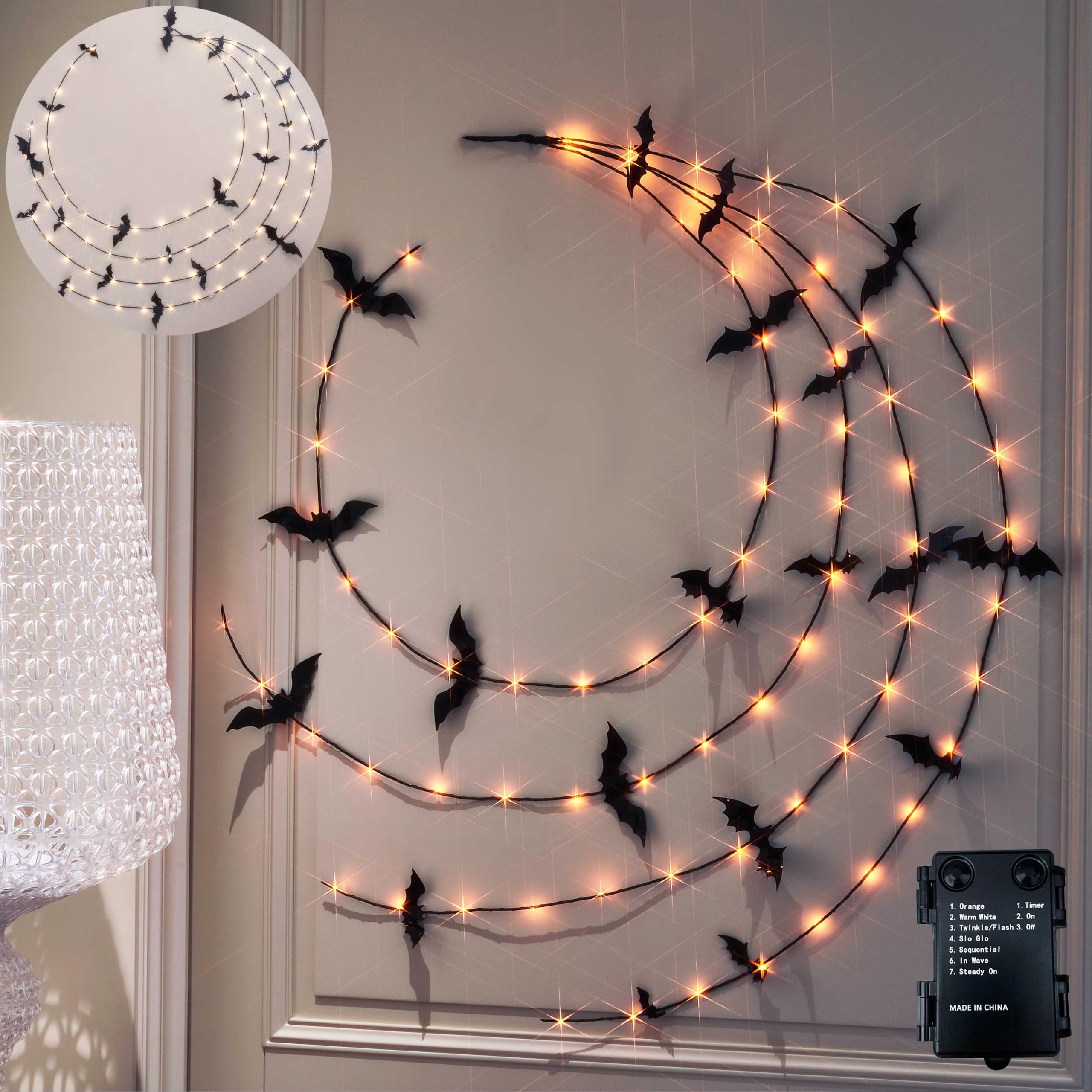 Photo 1 of LITBLOOM Halloween Garland with Lights 6FT 80 Orange and Warm White Fairy Lights, Lighted Black Garland Battery Operated with Timer Lit Bats for Wall Porch Decoration