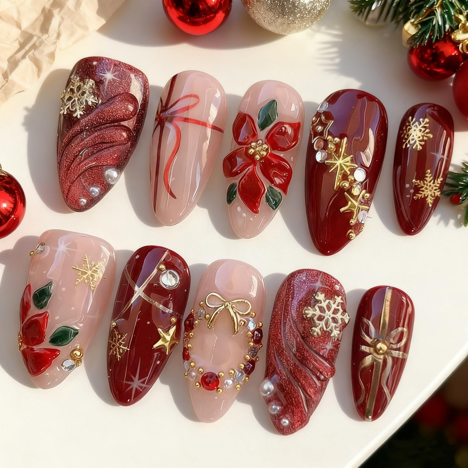 Photo 1 of 24Pcs Christmas Press on Nails Medium Almond Fake Nails with Xmas Wreath Rhinestones Designs 3D Winter Flower False Nail New Year Acrylic Nails Full Cover Gold Snowflake Glue on Nailsfor Women