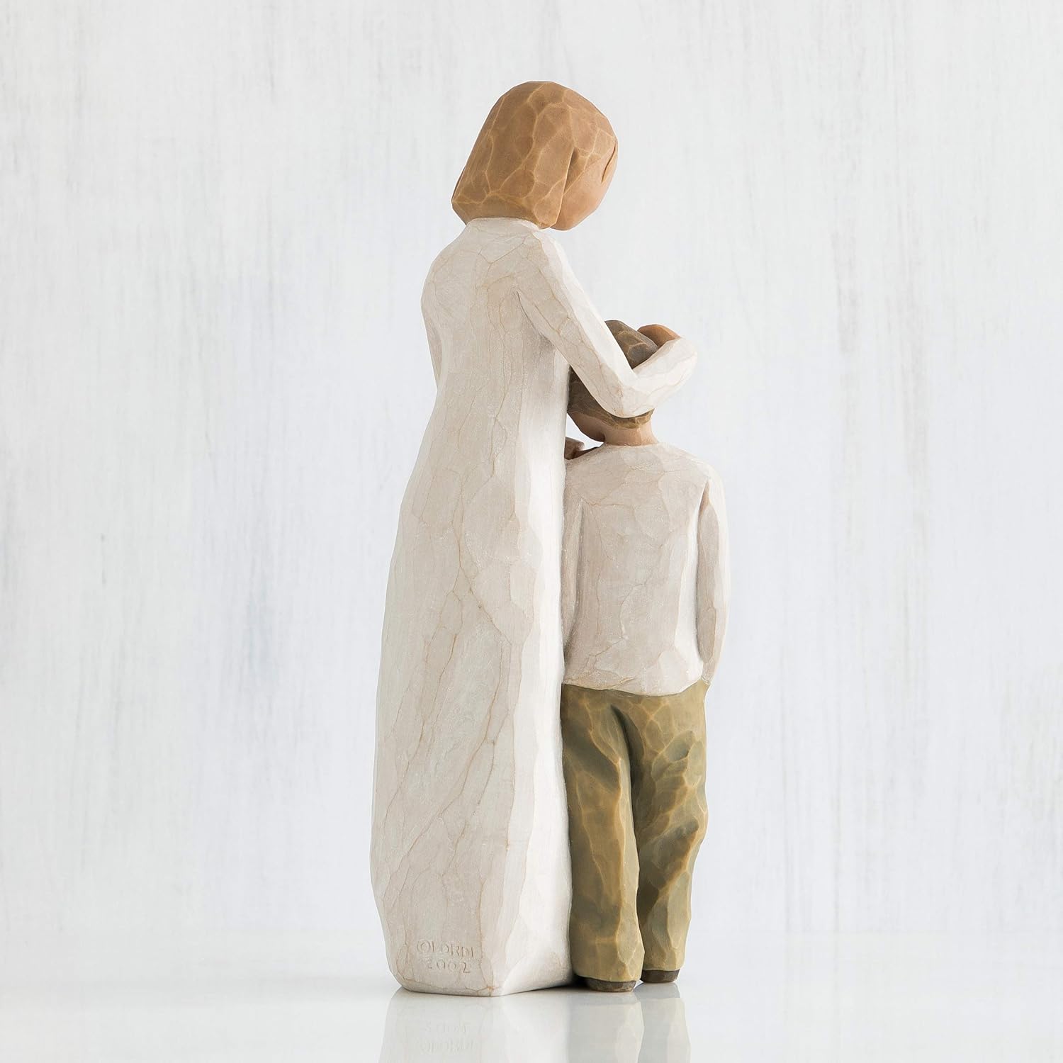 mother son figurines
