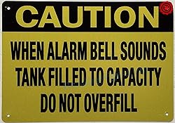 CAUTION WHEN ALARM BELL SOUNDS TANK FILLED TO