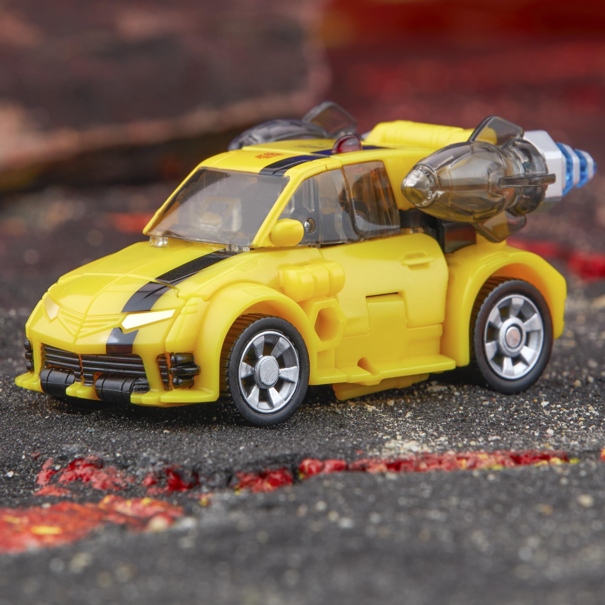Transformers Legacy Deluxe: Action Figure Bumblebee (Origine) 14cm, Convertibile In Hovercraft, Con Blaster E Accessori