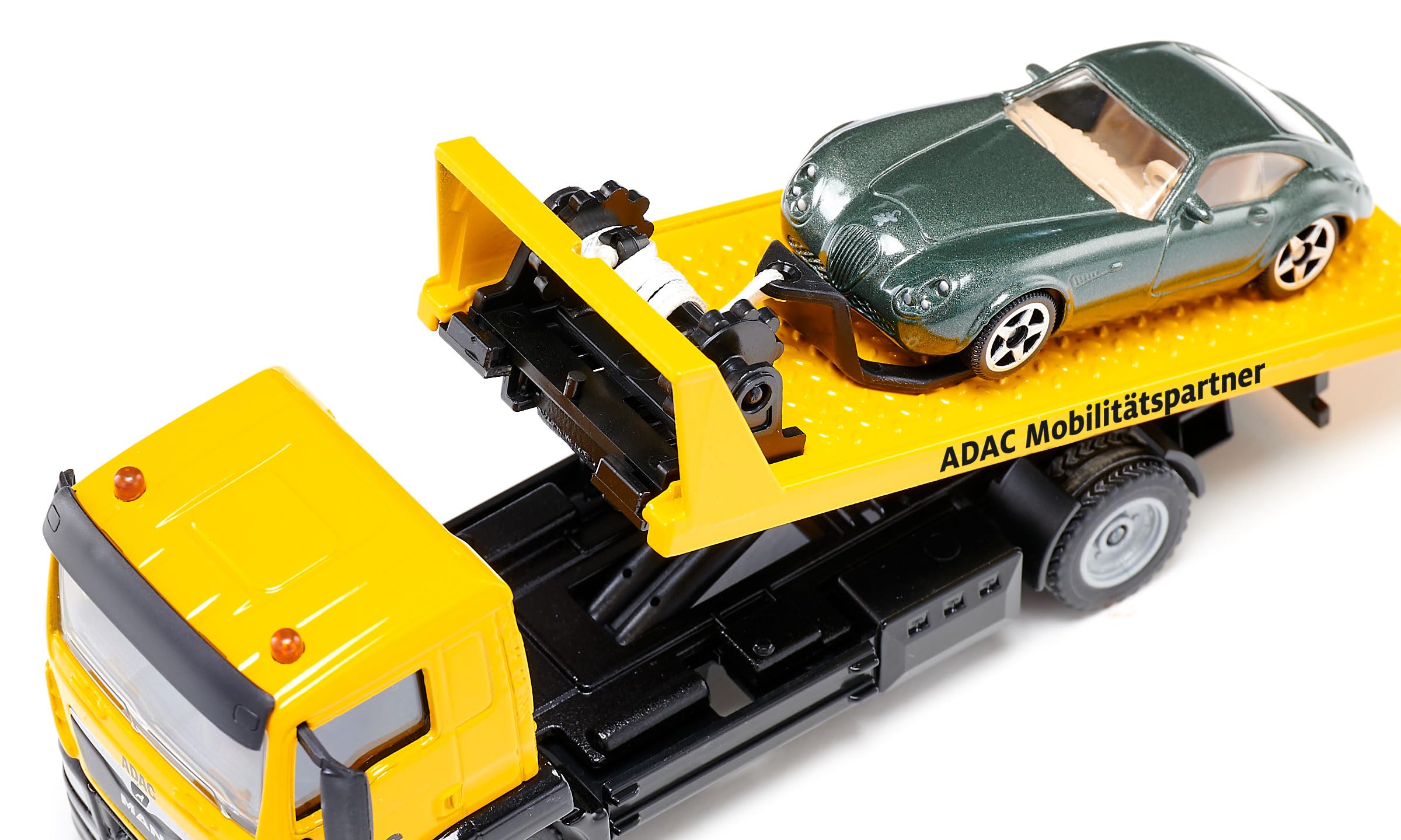 Siku 2722, MAN Abschleppwagen ADAC, Inkl. Abzuschleppendem Spielzeugauto, 1:55, Metall/Kunststoff, Gelb, Originalgetreue Funktionen, Ausziehbare Seilwinde, Kipp- und absenkbare Transportplattform 3