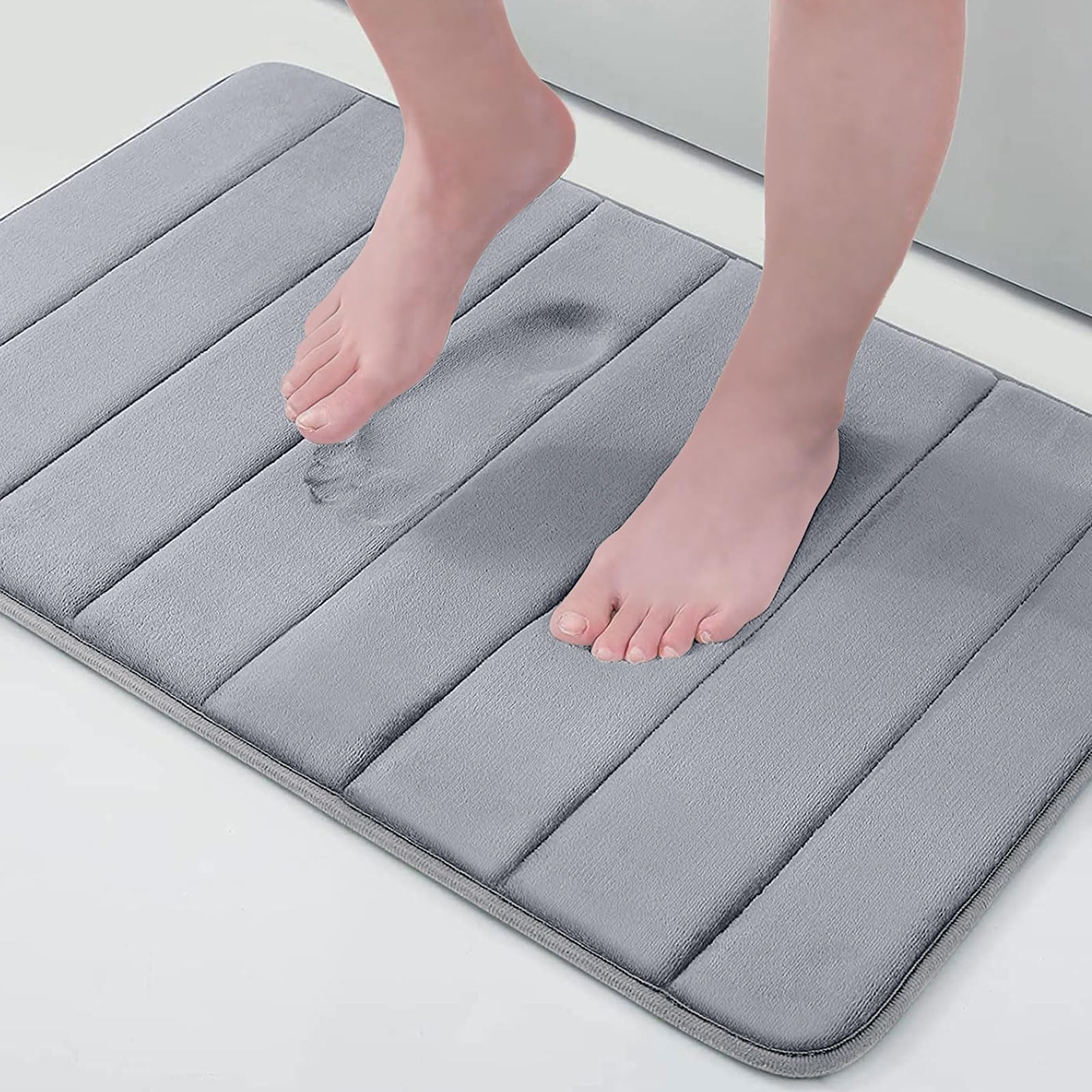 Photo 1 of Buganda Memory Foam Bath Mat, 24" x 16", Ultra Soft and Non-Slip Bathroom Rugs, Water Absorbent and Machine Washable Bath Rug for Bathroom, Shower, and Tub, Medium Grey