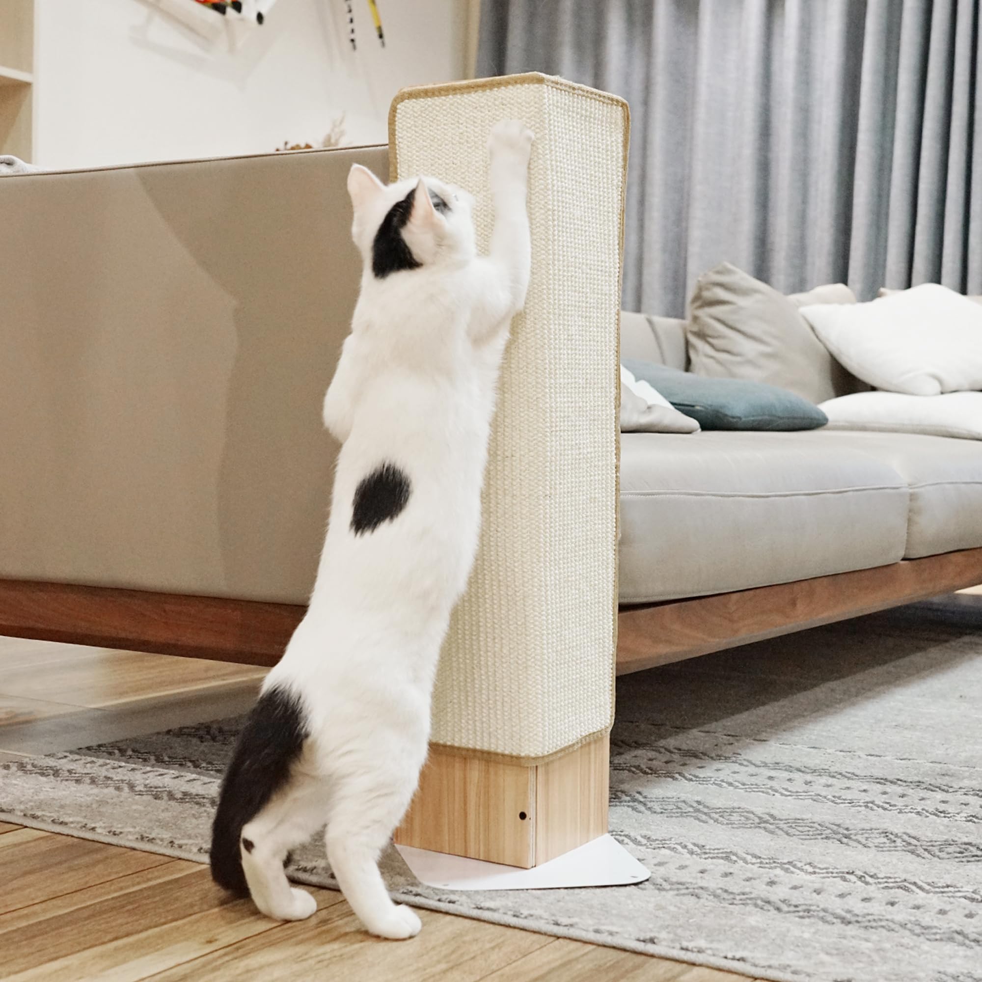 Photo 1 of PETKARAY Couch Corner Cat Scratcher, 28" Corner Scratching Post Wall Scratcher, Sisal Furniture Protector for Sofa with Reversible Base, Large