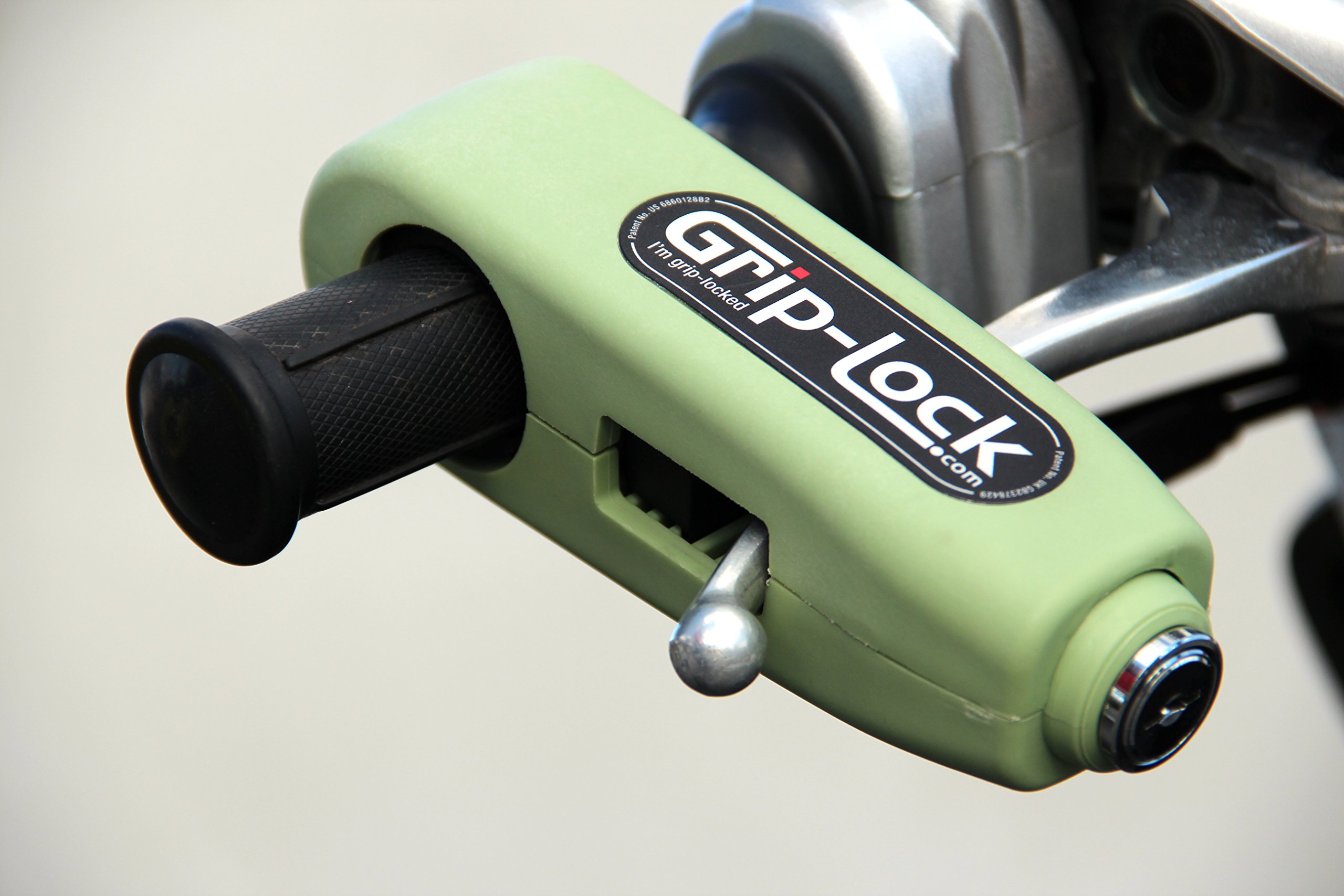 Grip-Lock - Red Grip-Lock is the smarter way of protecting your motorcycle from theft. It is mounted right at the handlebar and locks both throttle grip and brake lever. Applying and removing the Grip-Lock takes less than 10 seconds – so quick, you will use it every time. (0793573731241)
