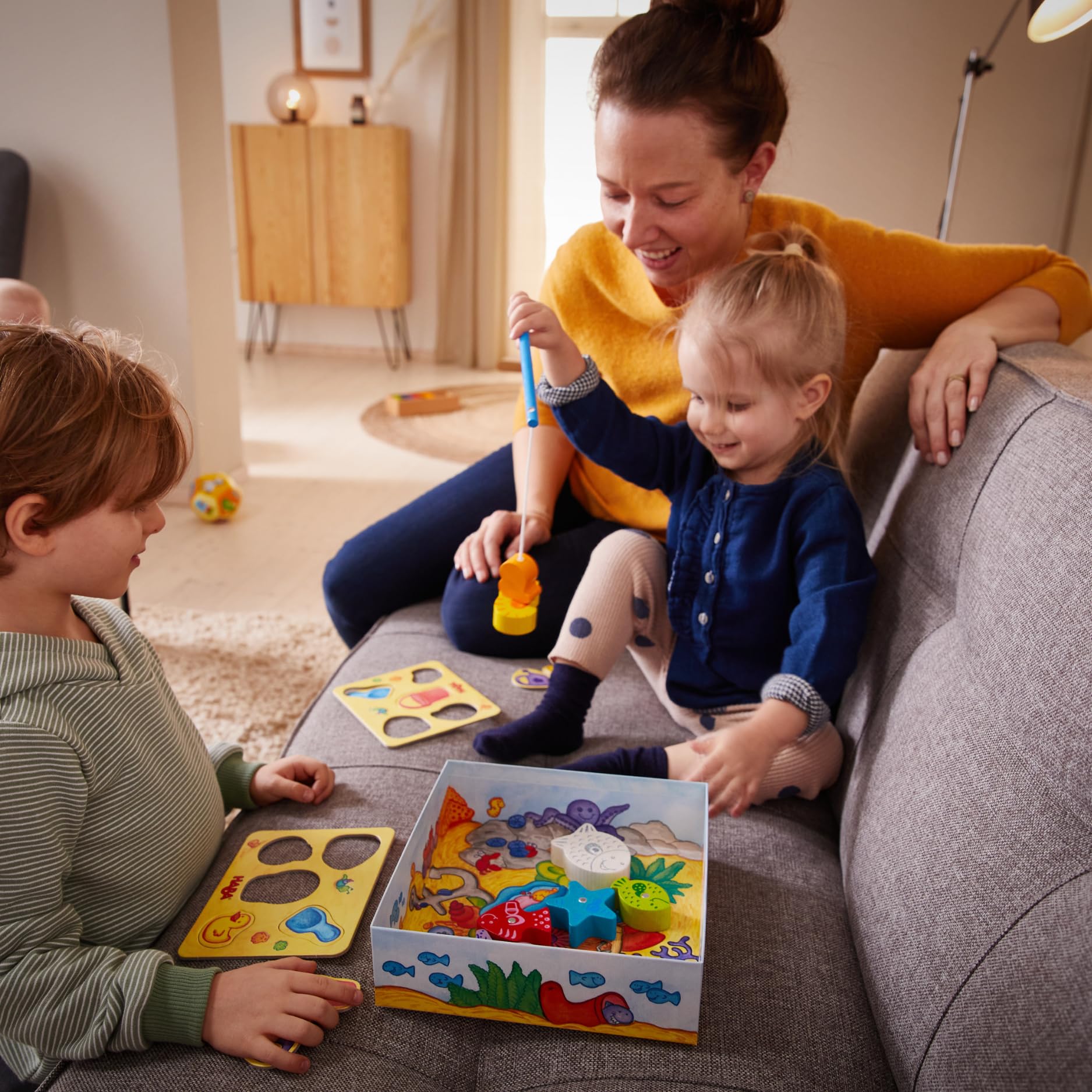 HABA Fische Angeln – Meine ersten Spiele – Angelspiel aus Holz für Kinder ab 2 Jahren – Fördert Feinmotorik, freies Spielen, Lernen & Farben-unterscheiden – 1004983001