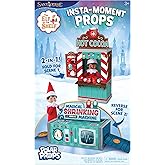 The Elf on the Shelf Insta-Props 2-in-1 Scene Kit with Reversible Pop Out Backdrop - Hot Cocoa Stand and Magic Shrinking Mach