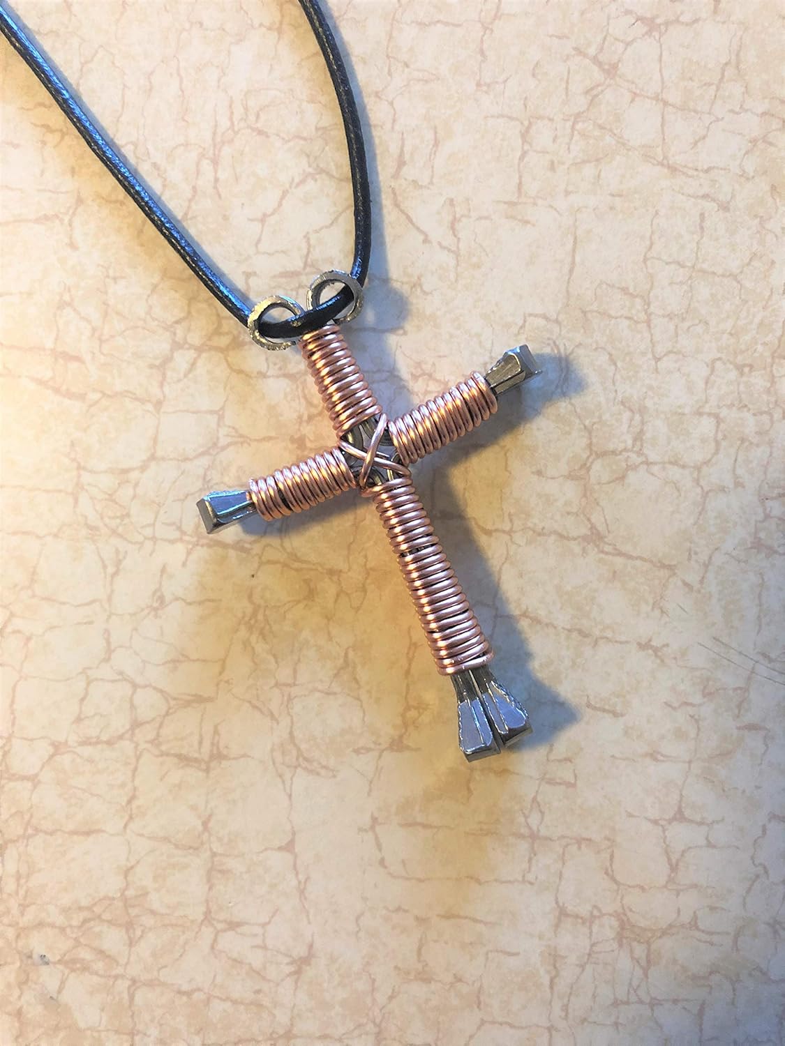 Handmade bent horseshoe nail cross with chain or leather