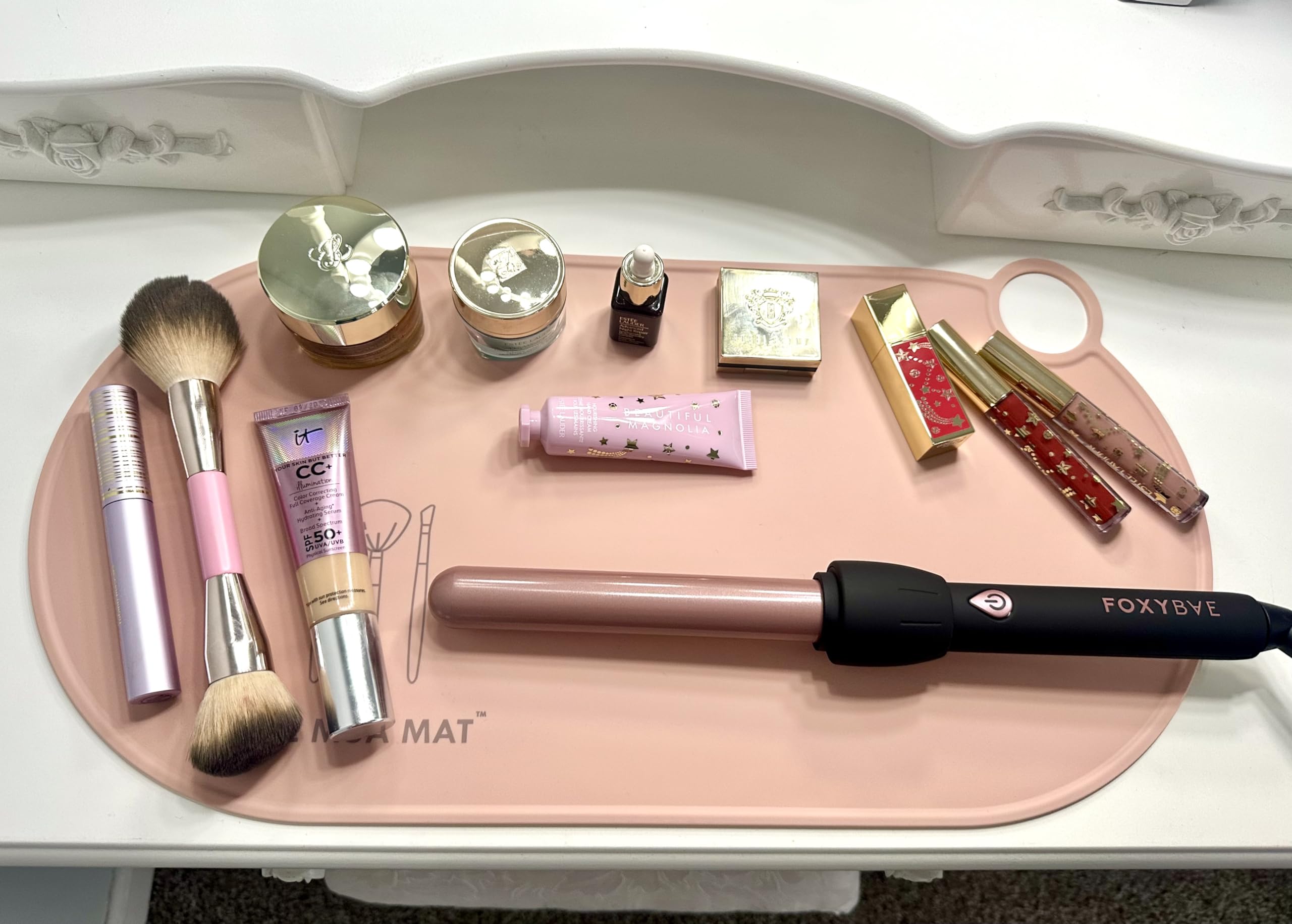 Photo 1 of Durable Silicone Vanity Makeup Mat - Heat Resistant, Portable, and Protective | Perfect for Travel and Daily Vanity Surface Protection (Pink)