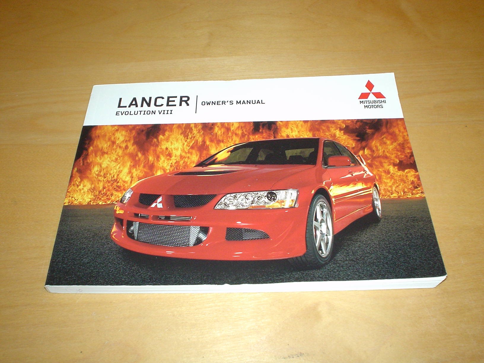 MITSUBISHI LANCER EVOLUTION VIII EVO 8 OWNERS MANUAL HANDBOOK (2003 - 2006)  - OWNER'S HAND BOOK MANUAL Paperback – 2004
