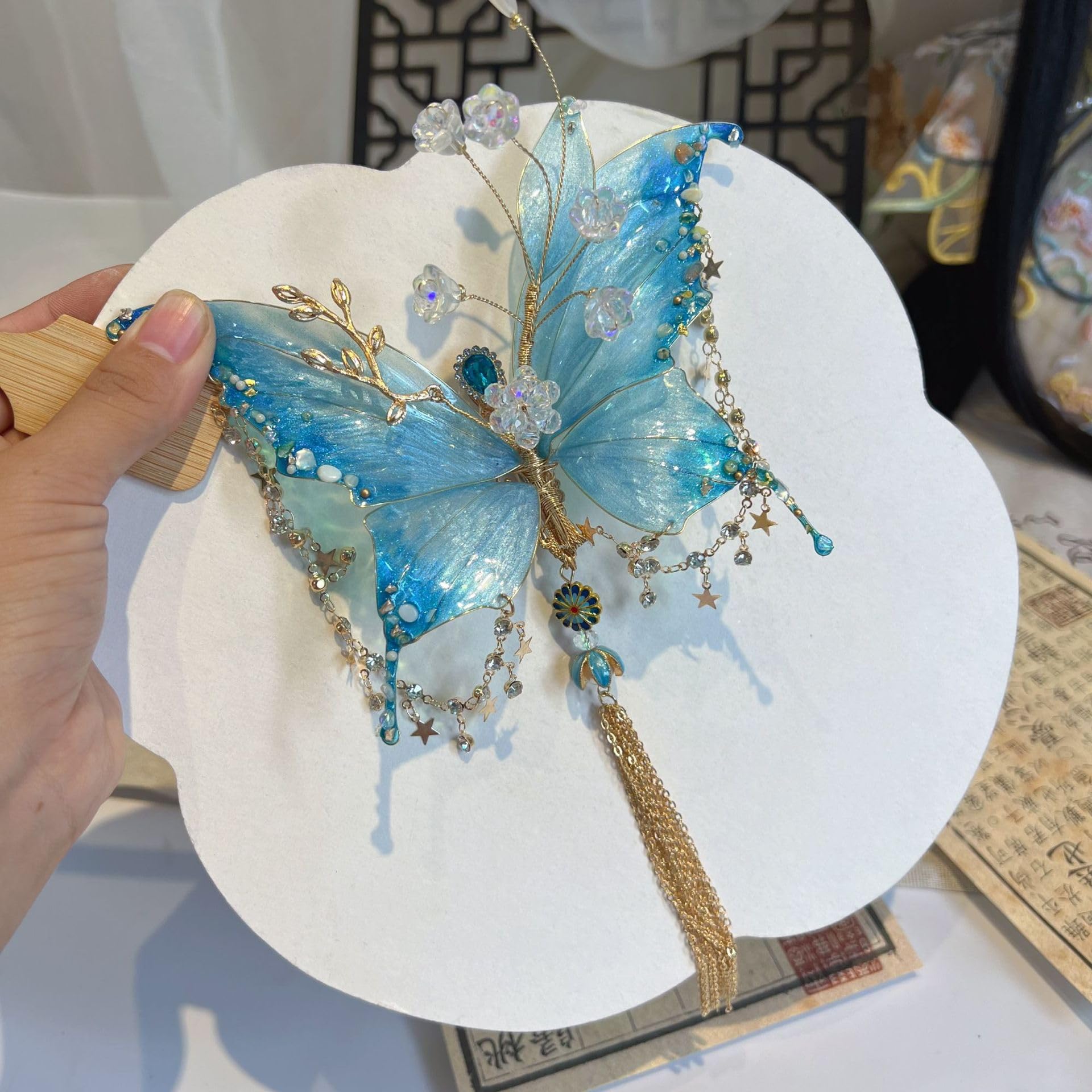 Photo 1 of Enssy Butterfly Hair Clip – Elegant Metal Hair Accessory for Women and Girls, Strong Hold Barrette, Lightweight and Durable-Blue