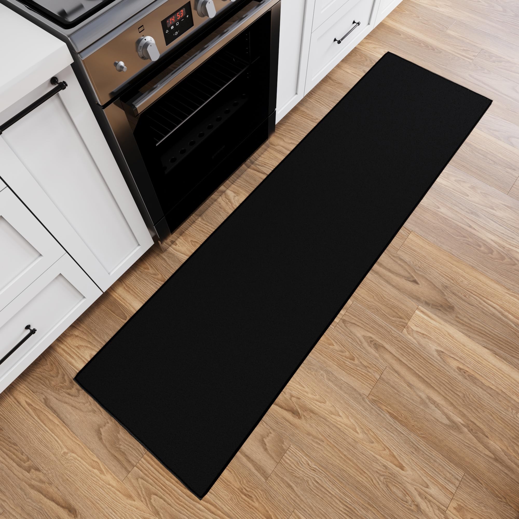 Photo 1 of Ottomanson 2x8 Non Slip Hallway Runner Rug with Rubber Backing - Solid Modern Kitchen Rug for Bedroom or Living Room, Black, 2' x 8'