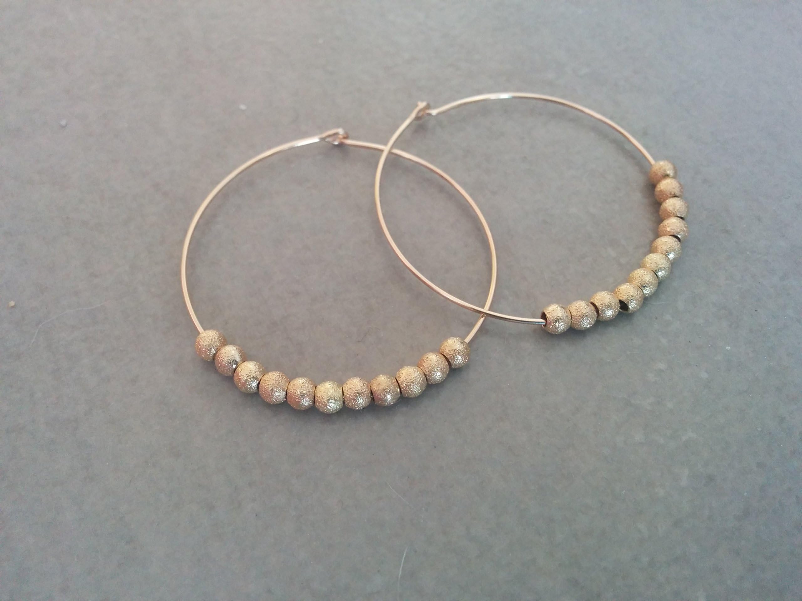 gold hoop earrings, hoop earrings