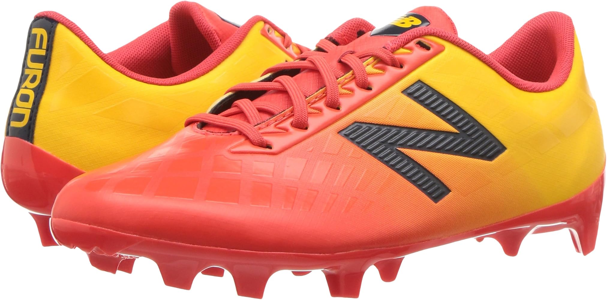 orange new balance football boots
