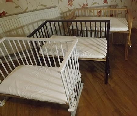 crib next to bed