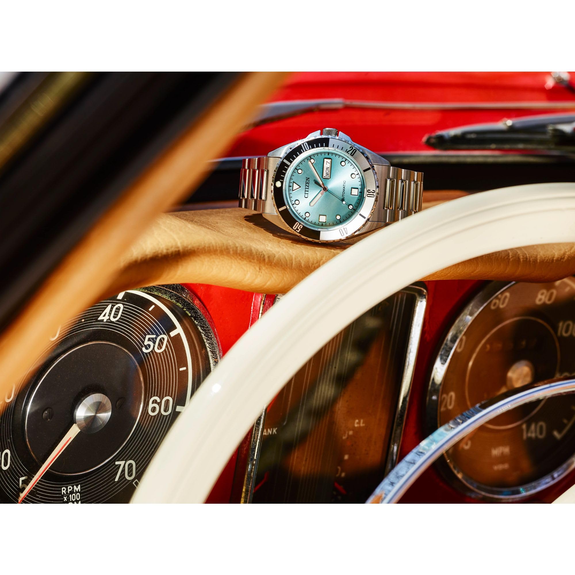 Citizen Men's Automatic Stainless Steel Watch, Light Blue Dial, Black and Silver Bezel, 3 Hand, Day/Date (Model: NH7530-52L)