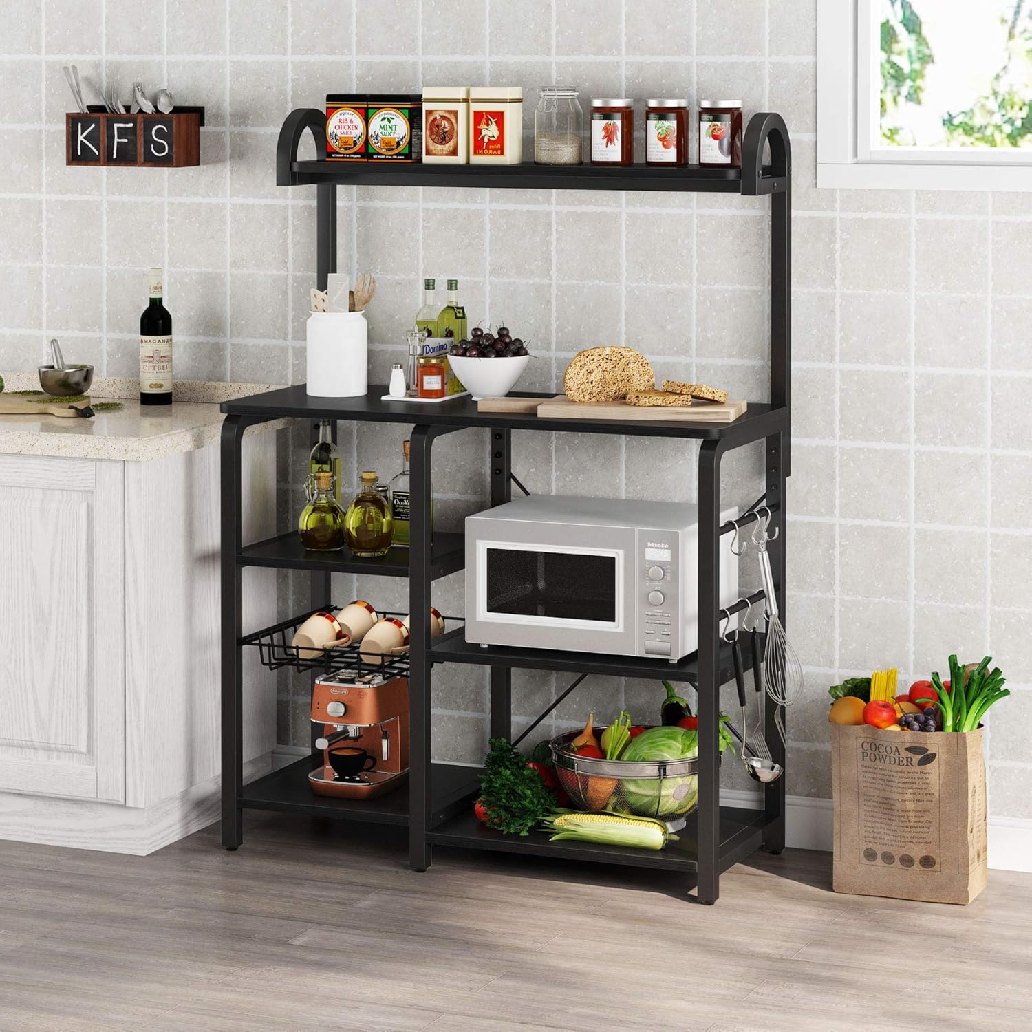 Tribesigns 35.5 inches Kitchen Baker’s Rack Microwave Oven Stand, Industrial Kitchen Cart Utility Storage Shelf Organizer Coffee Bar with Wire Basket and 6 Hooks (Black) - Standing Baker's Racks