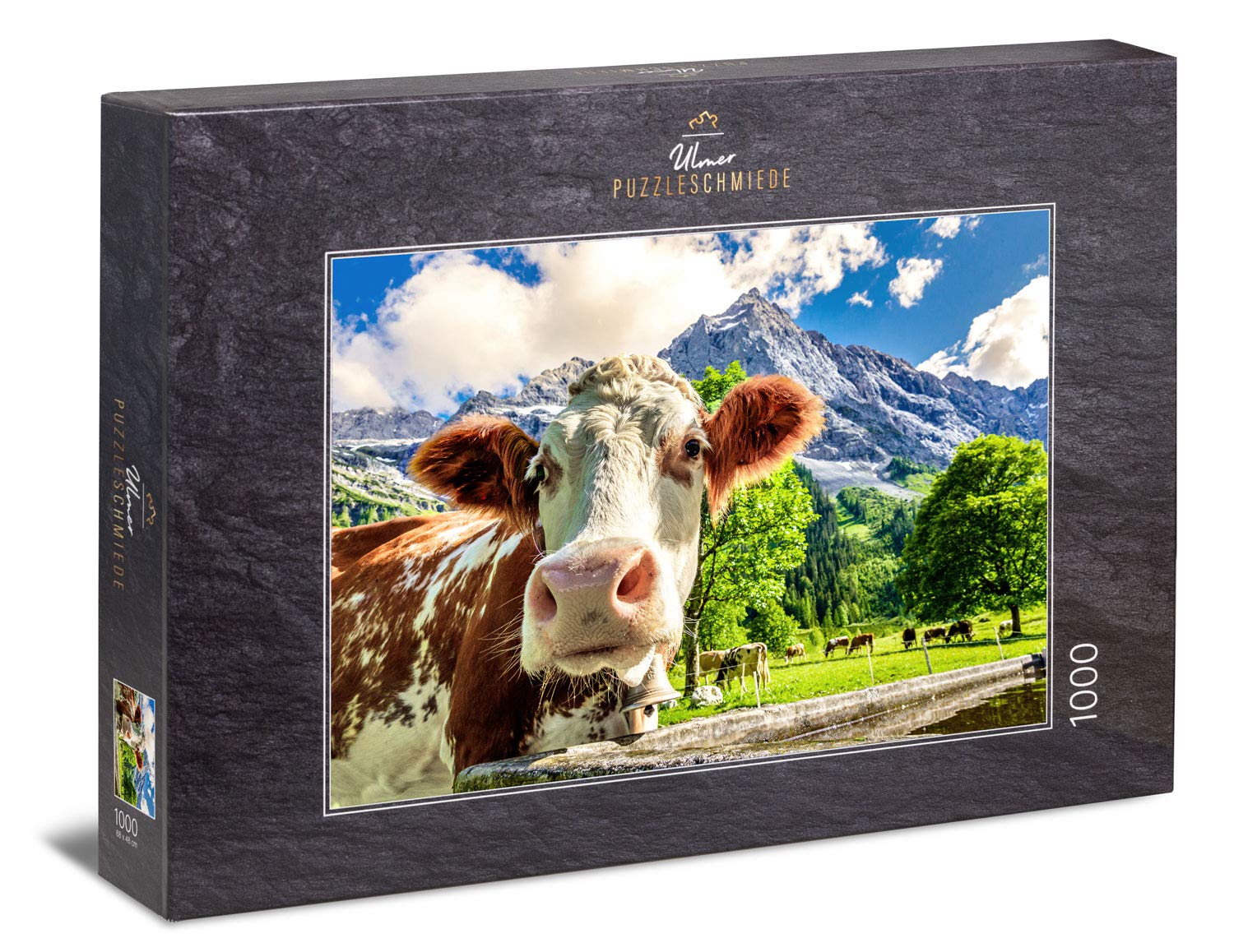Ulmer Puzzleschmiede - Puzzle "Cows and mountains": 1000 pieces jigsaw puzzle - A curious cow in front of a dreamlike mountain scenery in the Alps