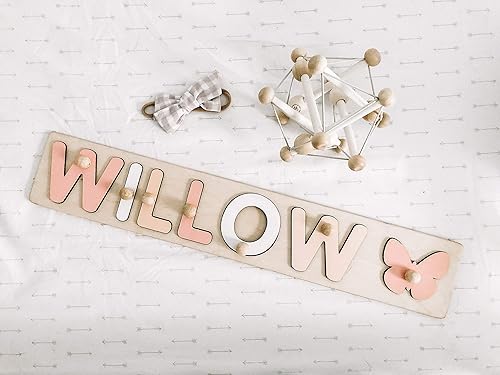 wooden name puzzle with pegs