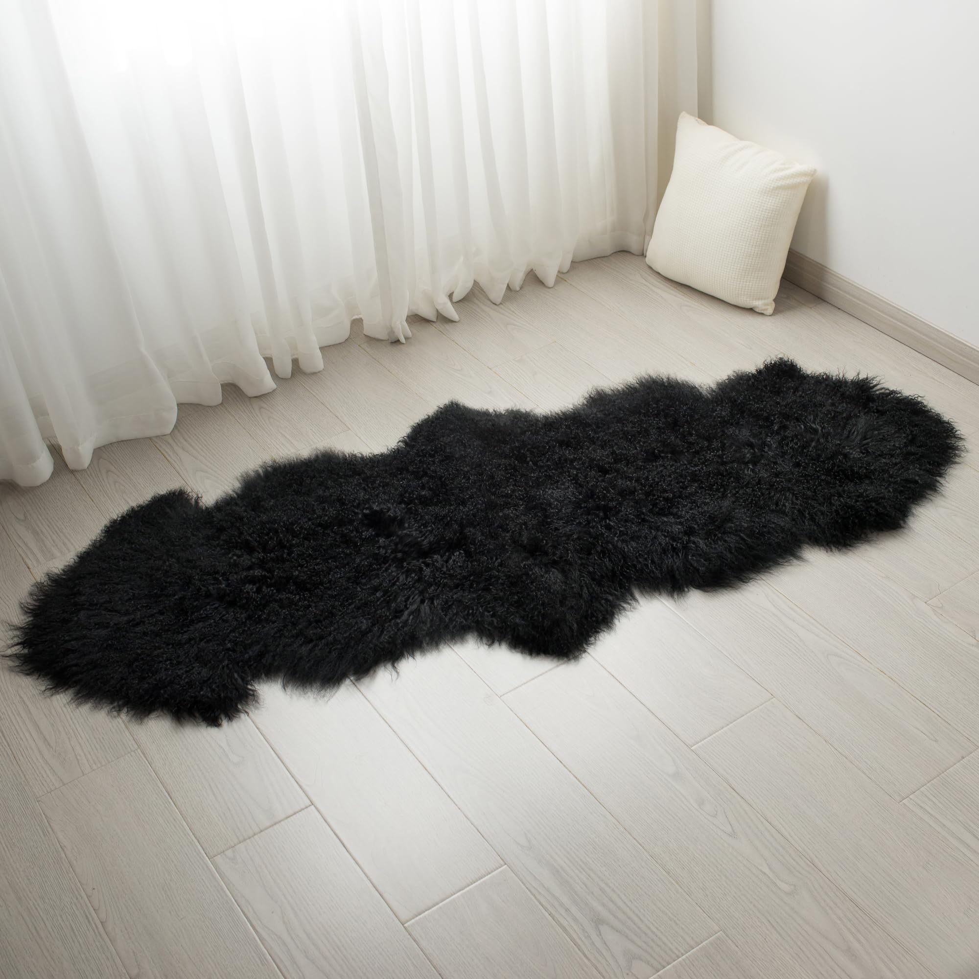 Photo 1 of CloudDwelling 100% Genuine Sheepskin Area Rug Real Lightweight Fluffy Soft Mongolian Long Wool Fur Carpet for Couch Bed Sofa Bedroom Living Room Black 2x5ft