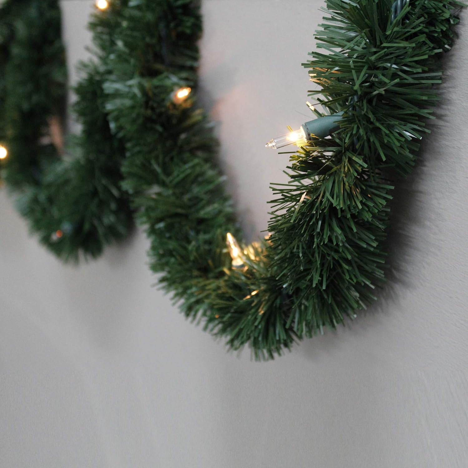 Brite Star 12-Feet Direct Plug in Lighted Pine Garland with 35 Count Clear Mini Lights