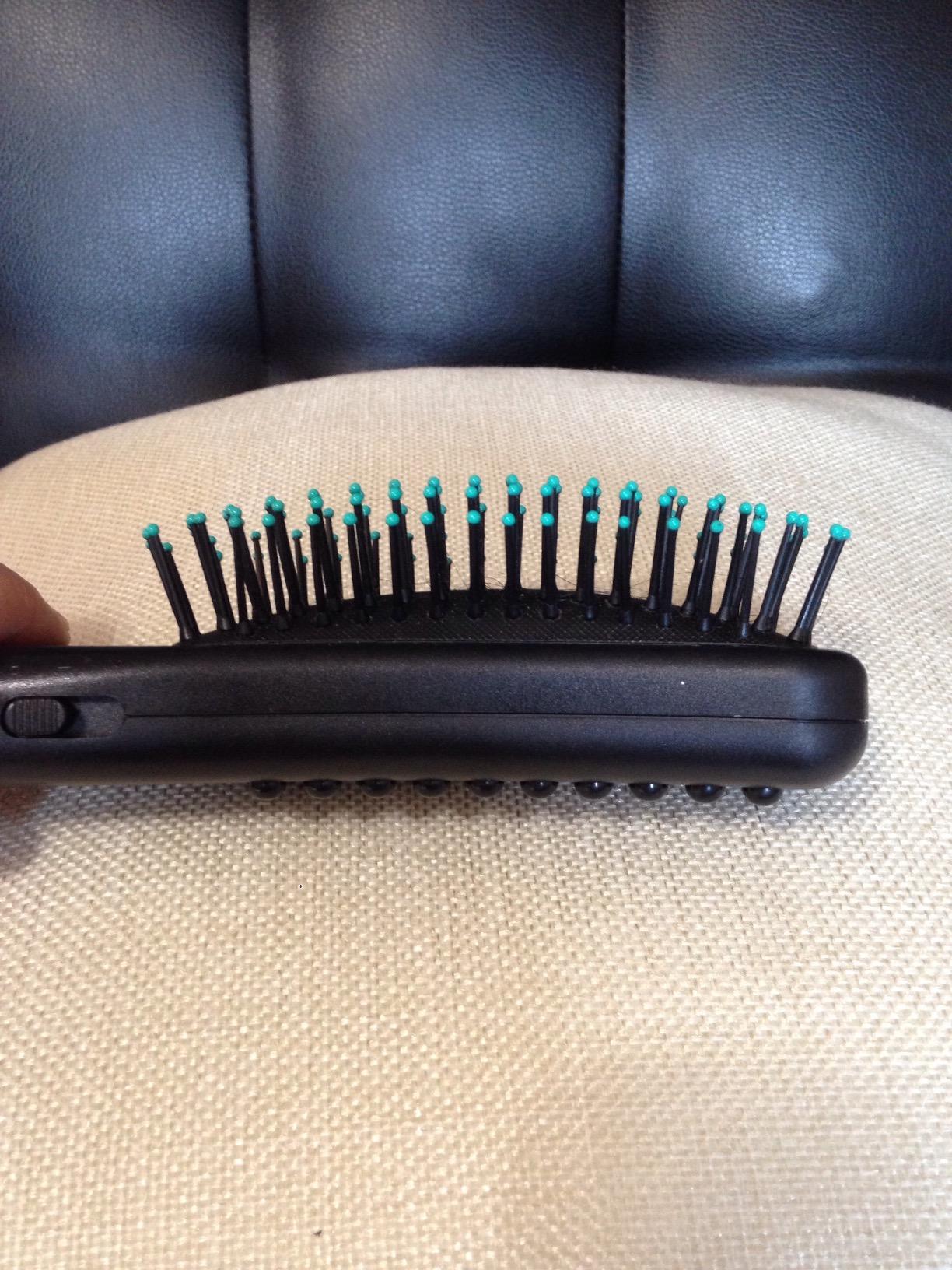 The Vibrating Massage Hair Brush  iKonicstyle