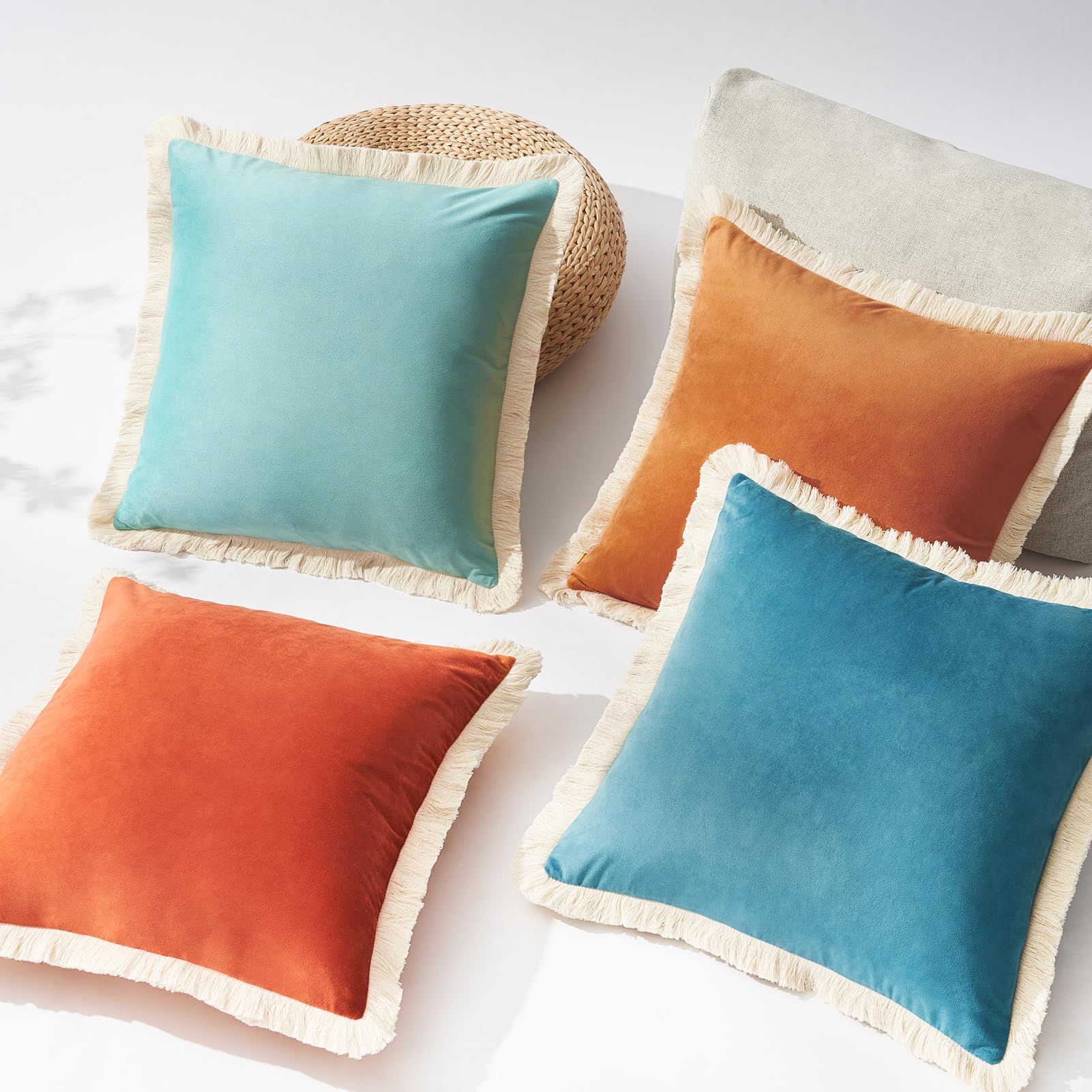 Photo 1 of MONDAY MOOSE Decorative Throw Pillow Covers, Set of 4 Soft Velvet Modern Fringe Tassel Designs, Mix and Match for Home Decor, Pillow Inserts Not Included (18x18 inch, Orange/Teal Blue)