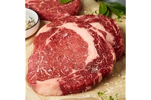 Premium Gift Boxed USDA Prime Ribeye Steaks - Wet-Aged to Perfection with Cooking Instructions - Steak Lover's Delight. Includes 4 Steaks, 10 oz. each, from Kansas City Steak Company.