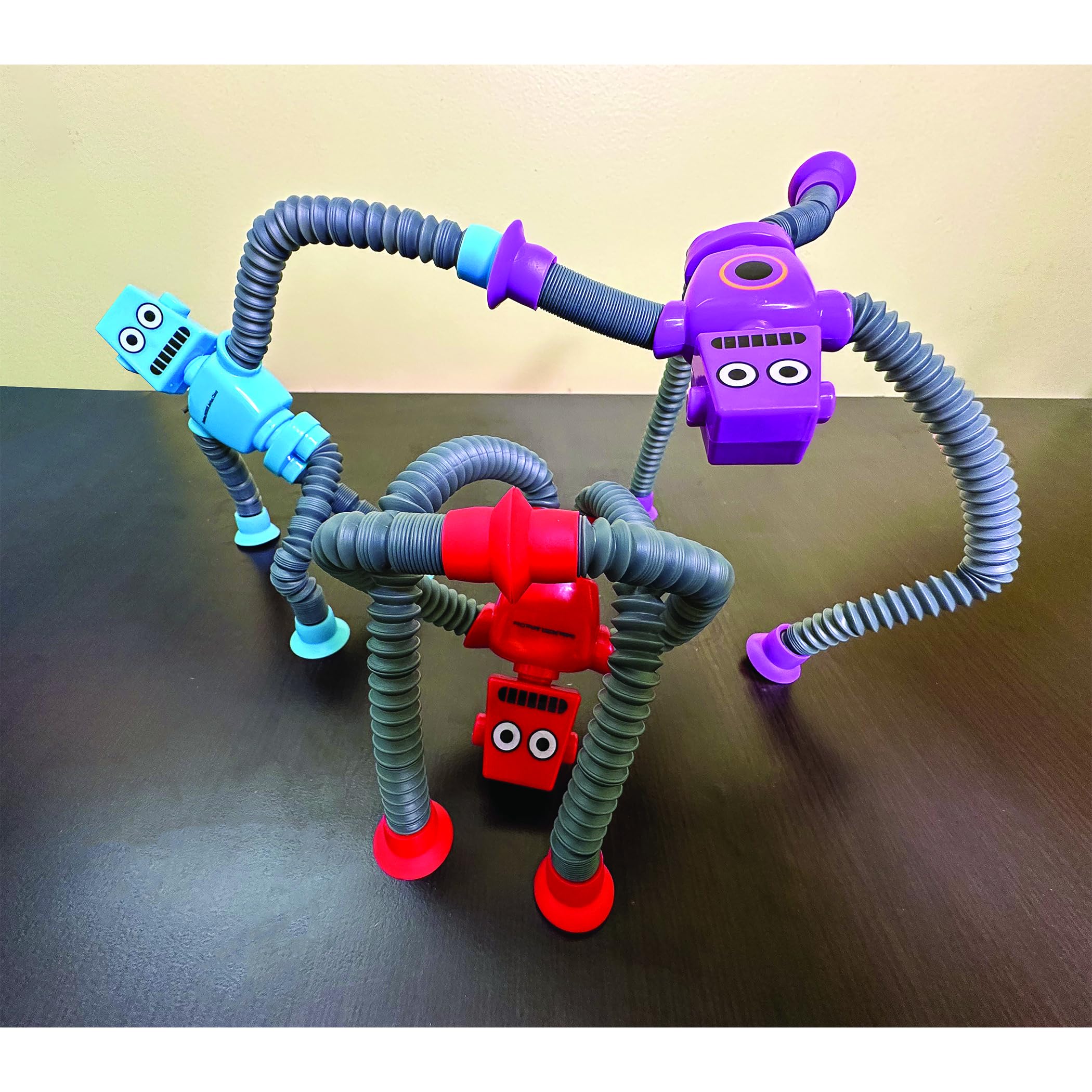 Raymond Geddes B-Bot Break-A-Zoid Robot Toys for Kids (12 Pack) – Bendable, Stretchable, Suction Cup Robots in 4 Colors – Sensory Fidget Fun