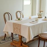 dsjorya Cotton Linen Blend Tablecloth, 55 x 70 in, Champagne Medallion | Rectangular cotton linen blend with a soft drape; helps repel light spills for kitchens, dining rooms and gatherings.
