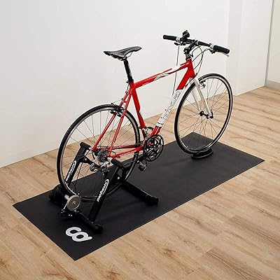 mat under peloton bike