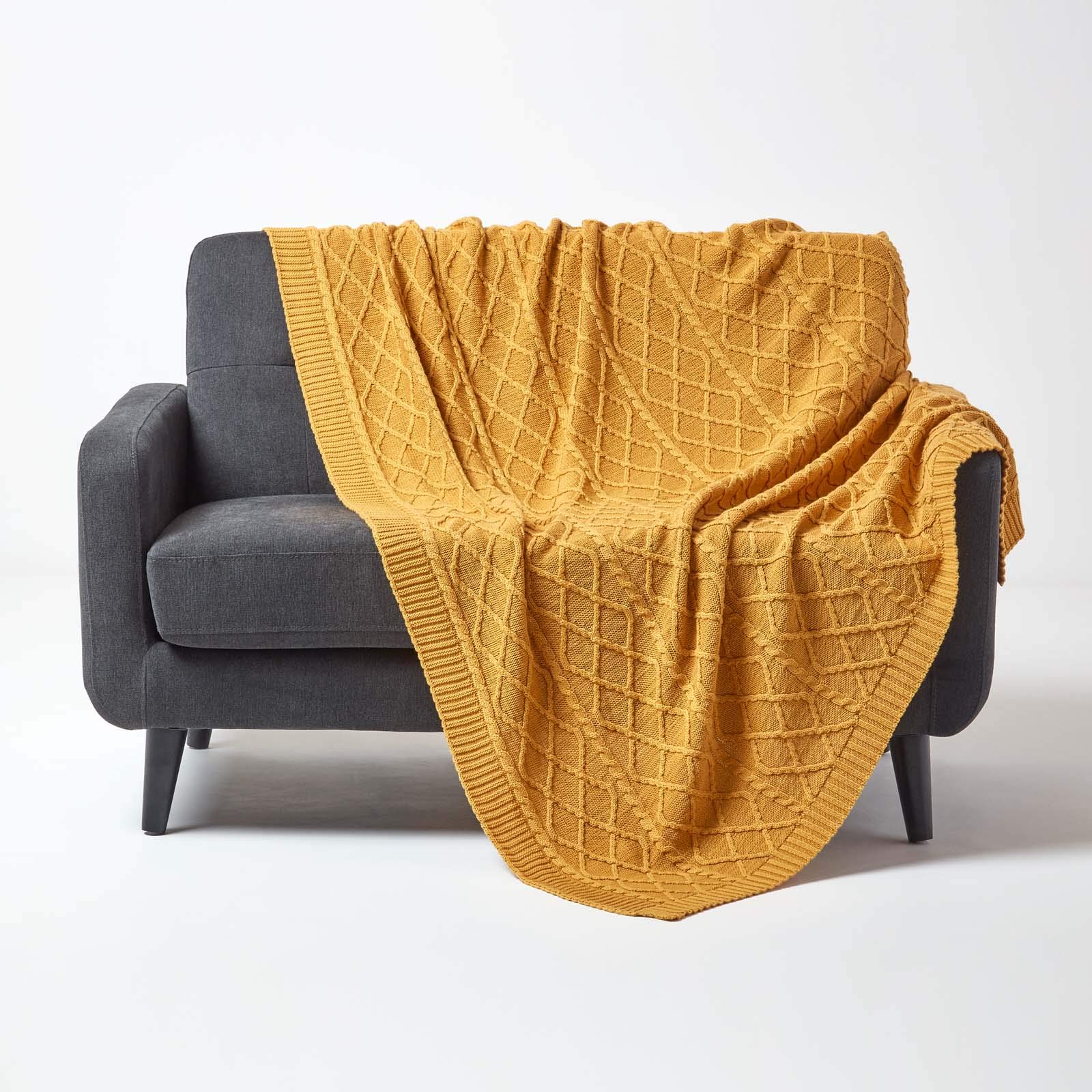 HOMESCAPES Luxury Mustard Knitted Throw Cable Knit Cotton Blanket Hand Knit Warm and Cosy Dark Yellow 100% Cotton Textured Diamond Pattern Sofa and Bed Throw, 130 x 170 cm