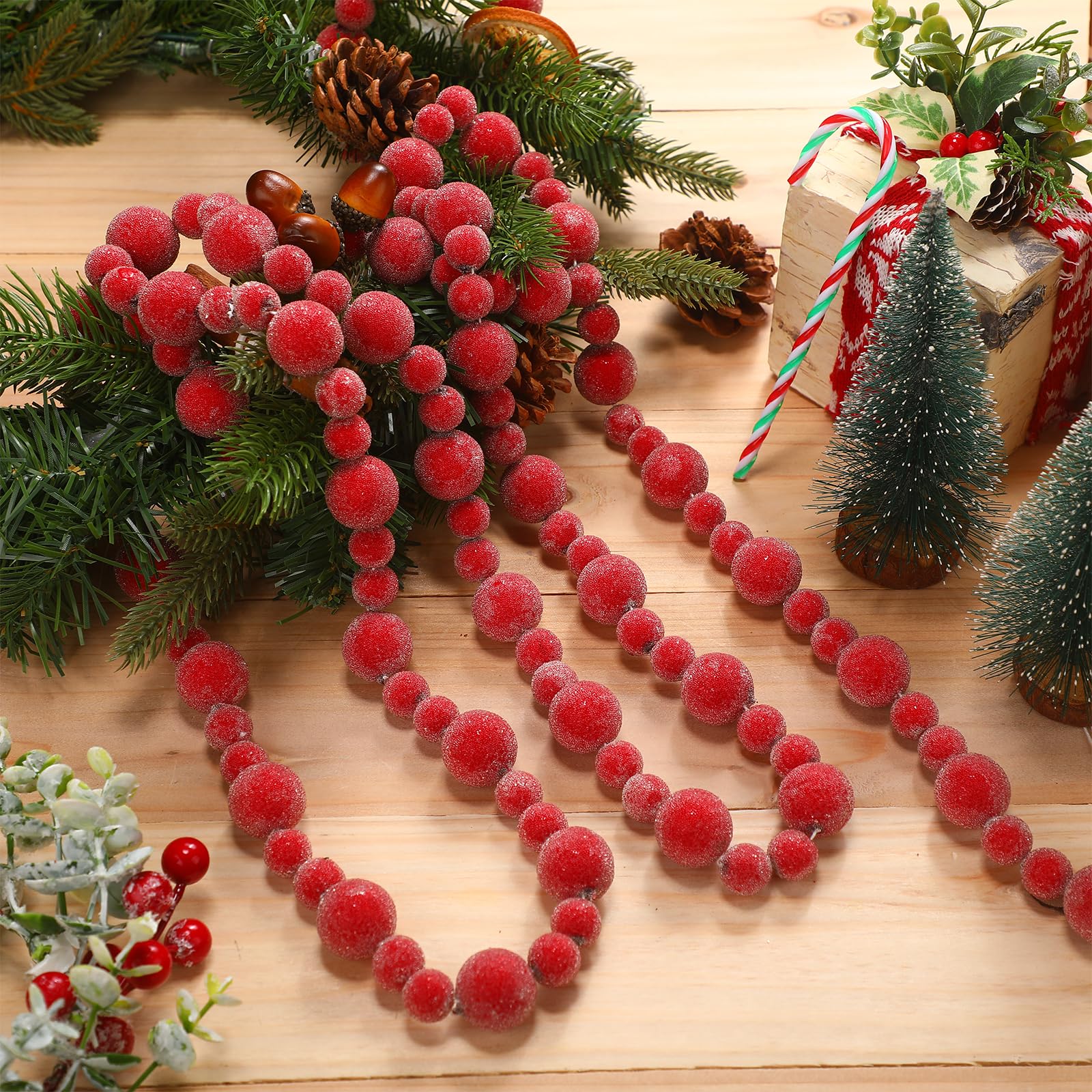 Photo 1 of Canlierr 9ft Sugared Red Berry Garland for Christmas Tree Artificial Christmas Snowy Holly Berry Garland Decor for Xmas Tree Indoor Home Room Holiday Party Decoration Birthday Party Supplies