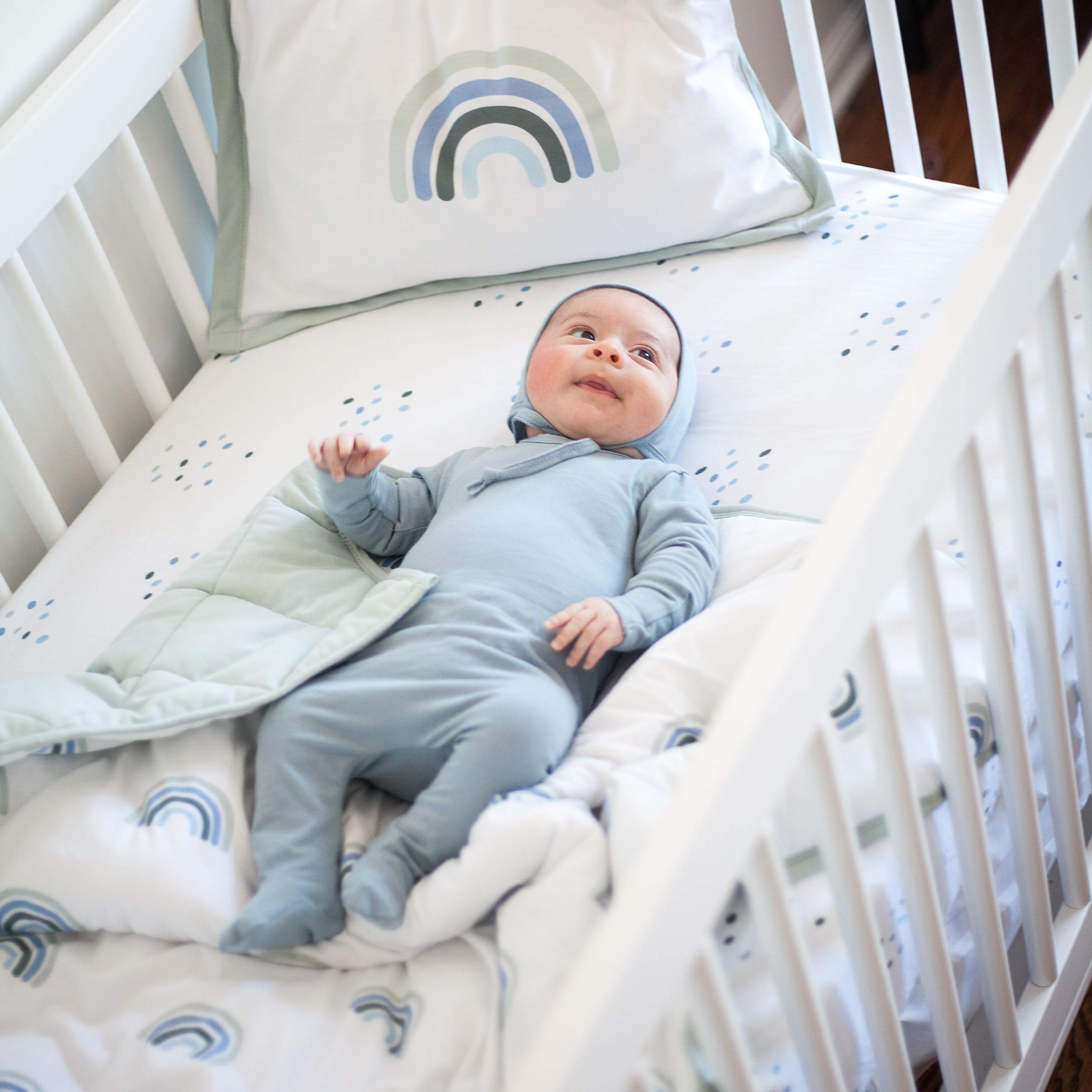 Ely's & Co. Baby Crib Bedding Sets for Boys and Girls — 4 Piece Set Includes Crib Sheet, Quilted Blanket, Crib Skirt, and Decorative Toddler (Blue Rainbow, 4 Piece)