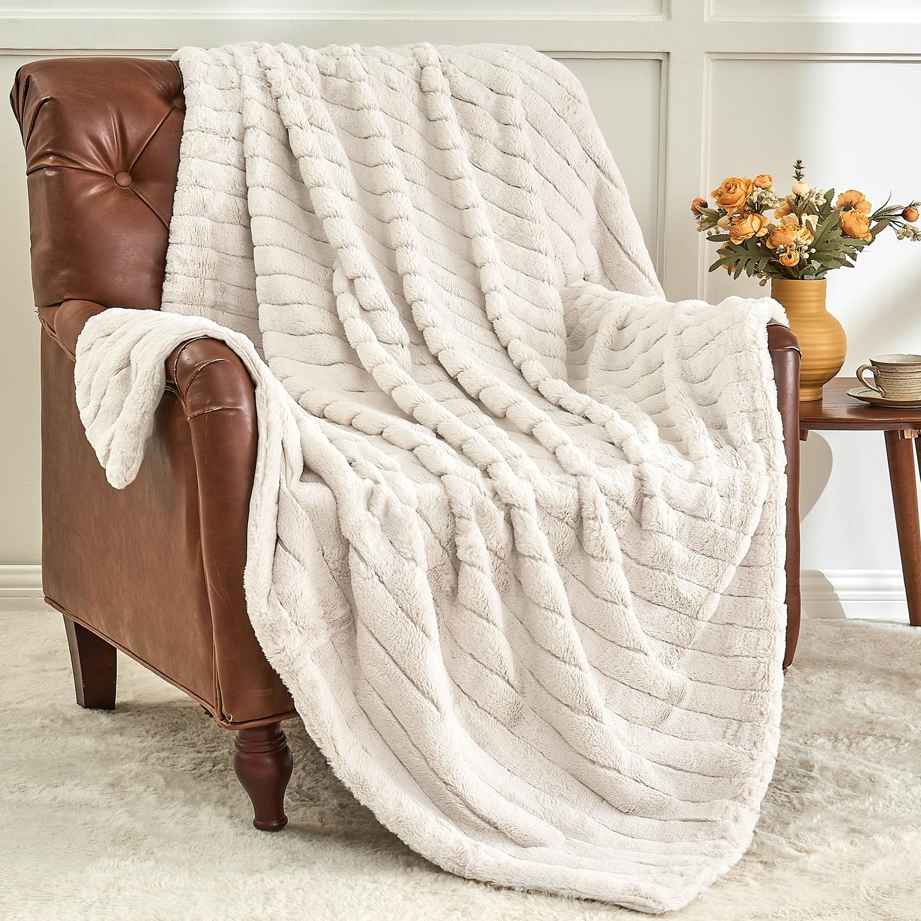 Photo 1 of ***FACTORY SEALED***BEDELITE Faux Fur Throw Blanket for Couch, Soft and Cozy 3D Ribbed Fluffy Blanket, Thick Warm Plush Fuzzy Faux Rabbit Fur Blanket for Women Gift (Beige, 50"x 60")