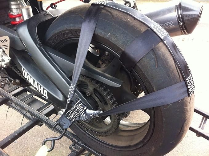 Rear wheel tie down straps supports transporting motorbike on trailor