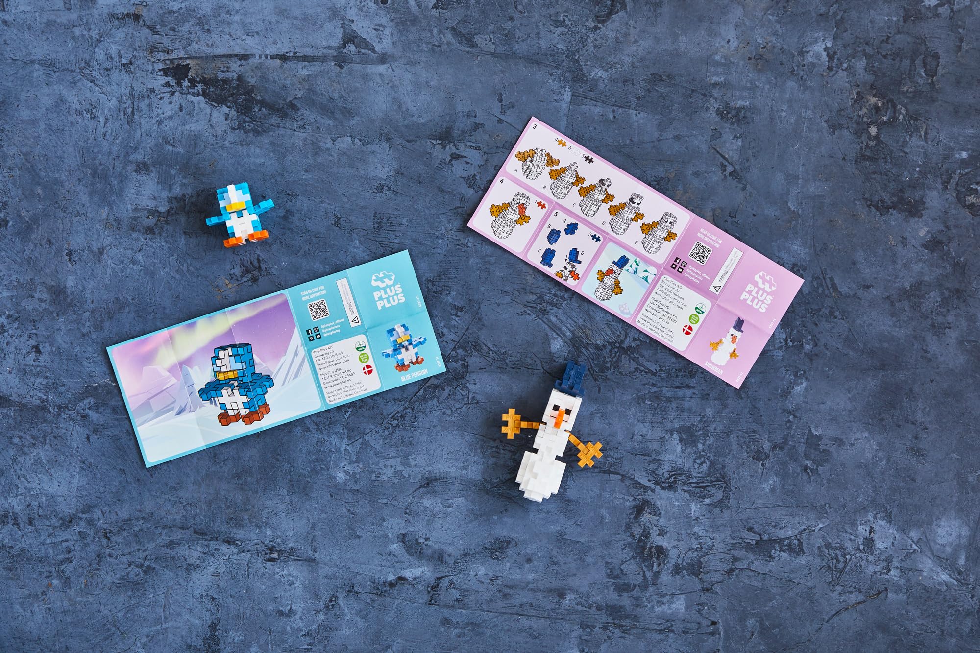 Plus Plus - Adventskalender mit 25 Überraschungen – Bauspiel für Kinder – kreatives Weihnachtsabenteuer mit Anleitung – ca. 600 Teile – für Mädchen und Jungen ab 5 Jahren 2