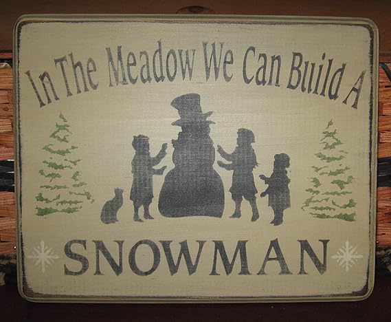 Amazon Com Burkewrusk Primitive Country In The Meadow We Can Build A Snowman Sign Christmas Winter Wood Sign Home Kitchen