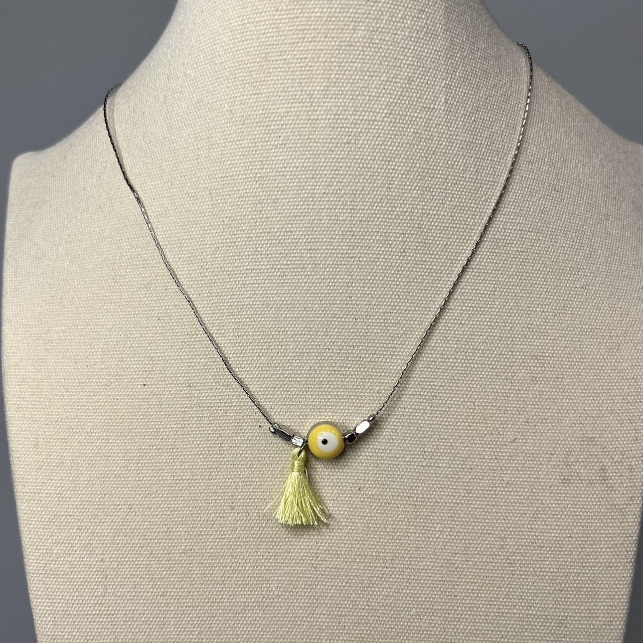 Evil Eye Pendant, Yellow Faux Suede Tassel (JIT)
