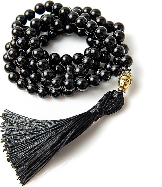 Sofisticata collana di perle bianche e perle nere con chiusura d'oro